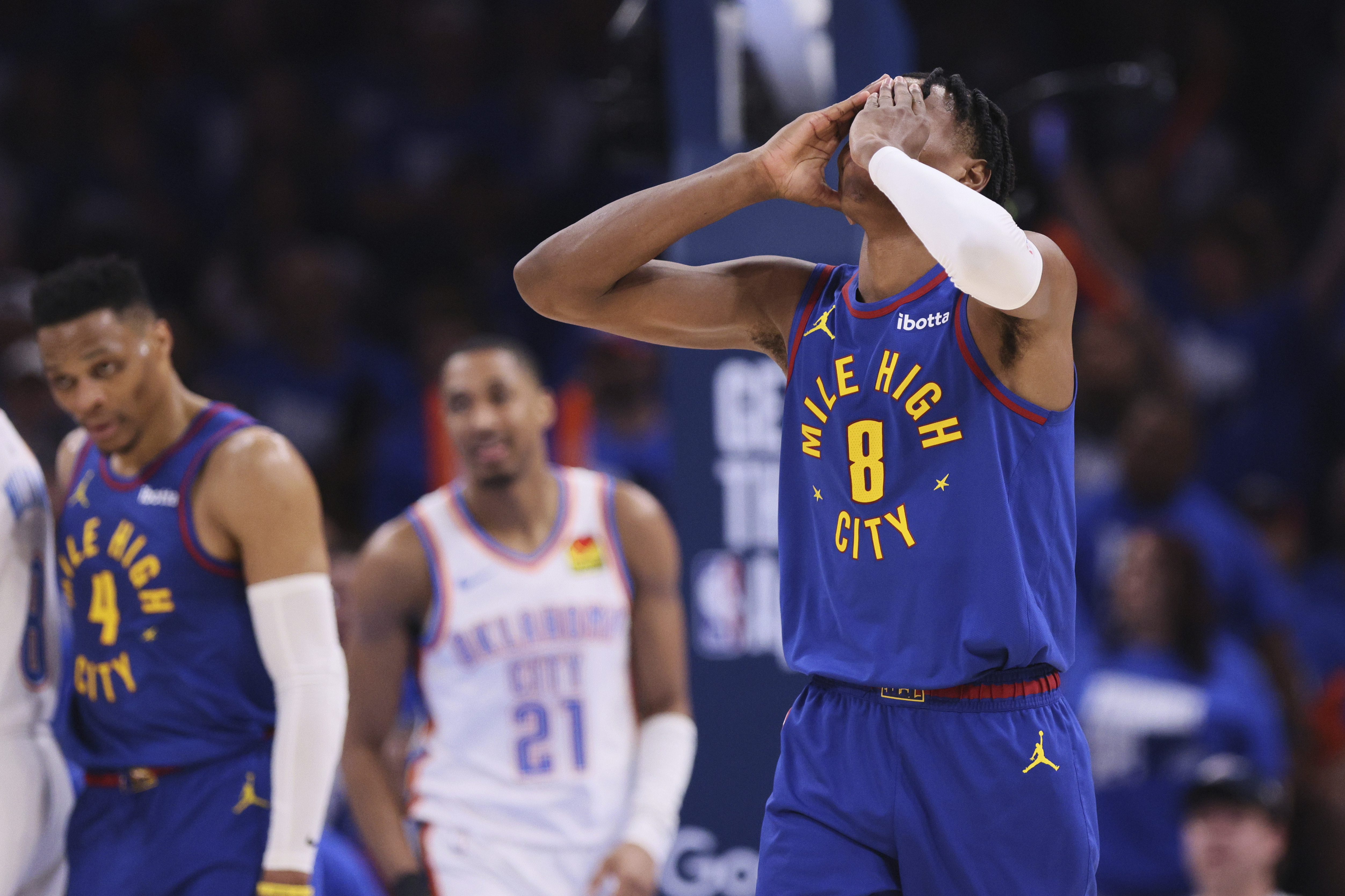 Denver Nuggets forward Peyton Watson (8) reacts to a shot clock violation late in the second half of Game 5 of an NBA basketball second-round playoff series against the Oklahoma City Thunder Tuesday, May 13, 2025, in Oklahoma City. (AP Photo/Nate Billings) (Nate Billings)