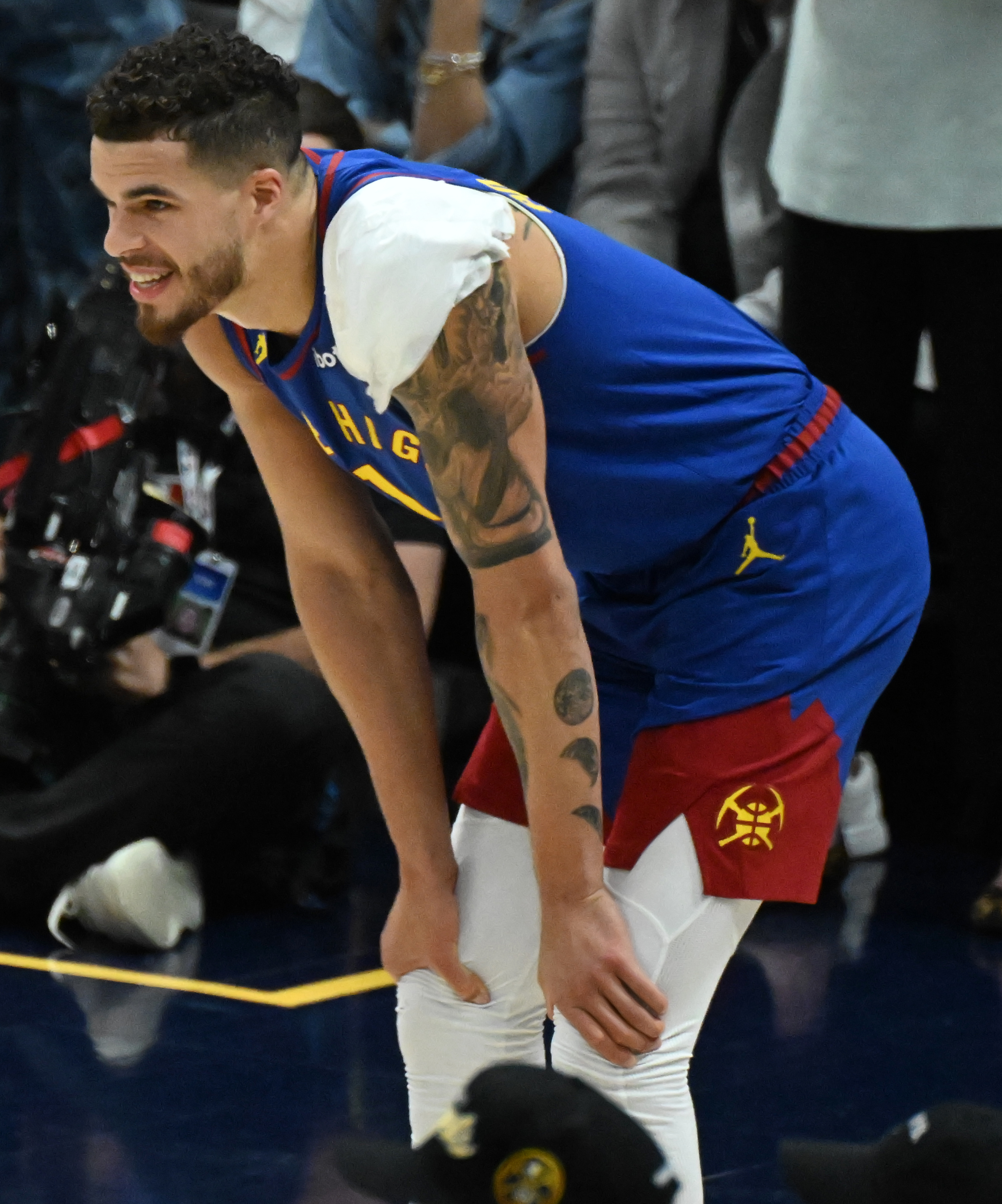 Denver Nuggets forward Michael Porter Jr. (1) is all smiles in between plays during overtime of game 3 of round 2 of the Western Conference Championship at Ball Arena on Friday, May 9, 2025. The Nuggets won the game 113-104. (Jerilee Bennett,The Gazette)