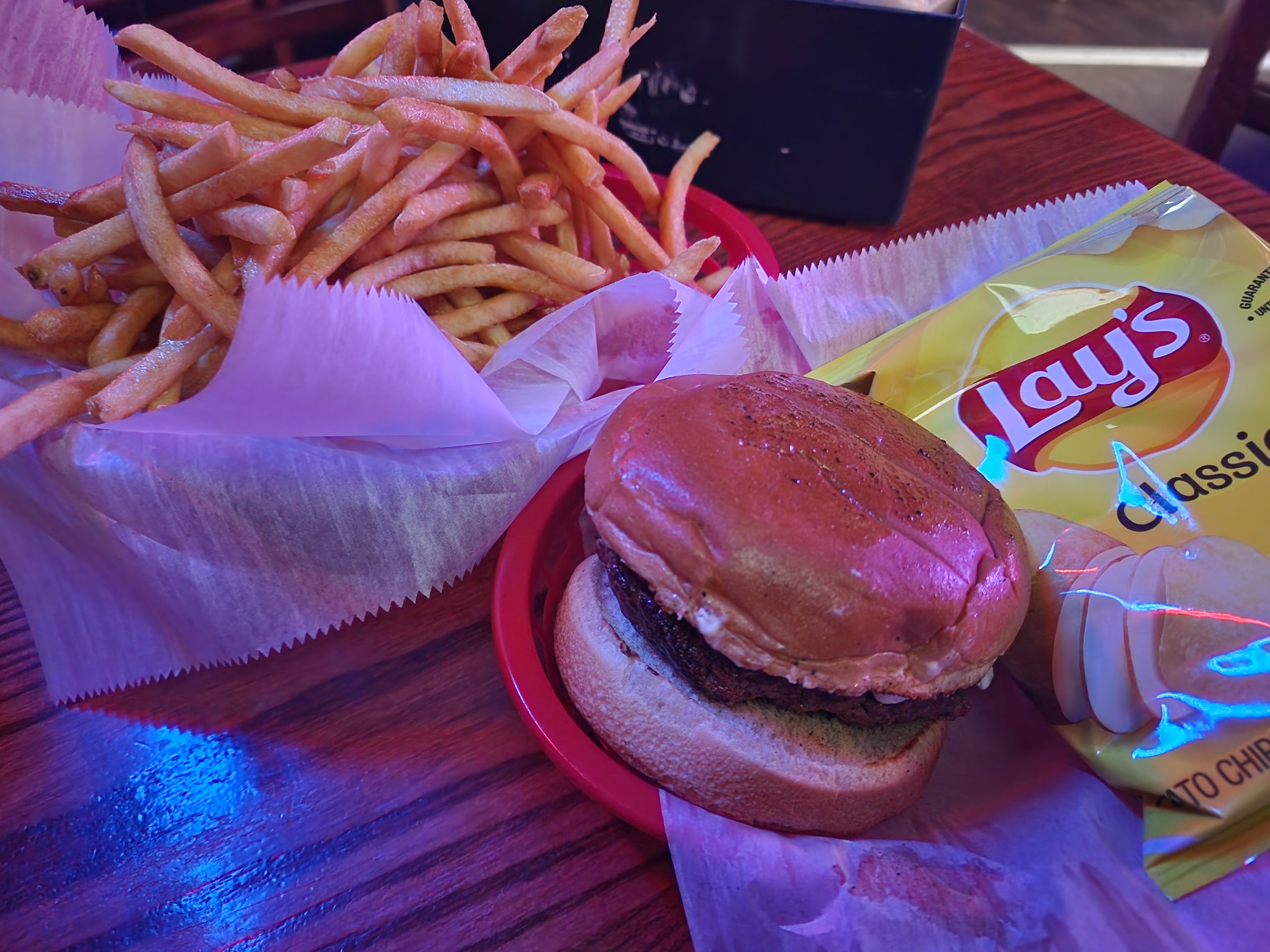 The jalapeno cream cheese burger served at Candlelight Tavern in Denver's Wash Park neighborhood. (Marco Cummings)