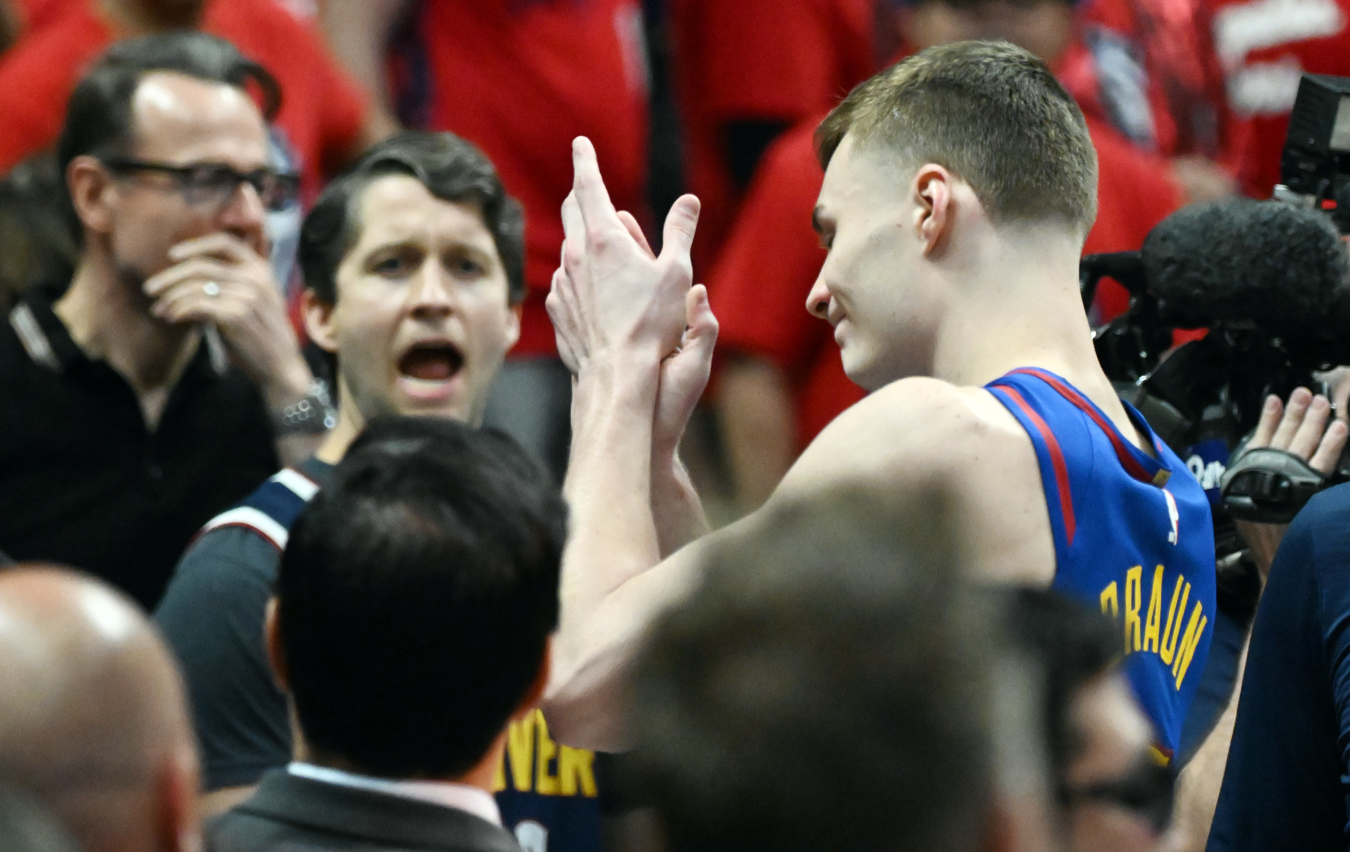 Denver Nuggets guard Christian Braun (0) applauds the crowd after Game 7 of Round 1 of the Western Conference Championship on Saturday, April 3, 2025. The Nuggets defeated the Clippers 120-101 and will play the Thunder in the second round. (Jerilee Bennett,The Gazette)