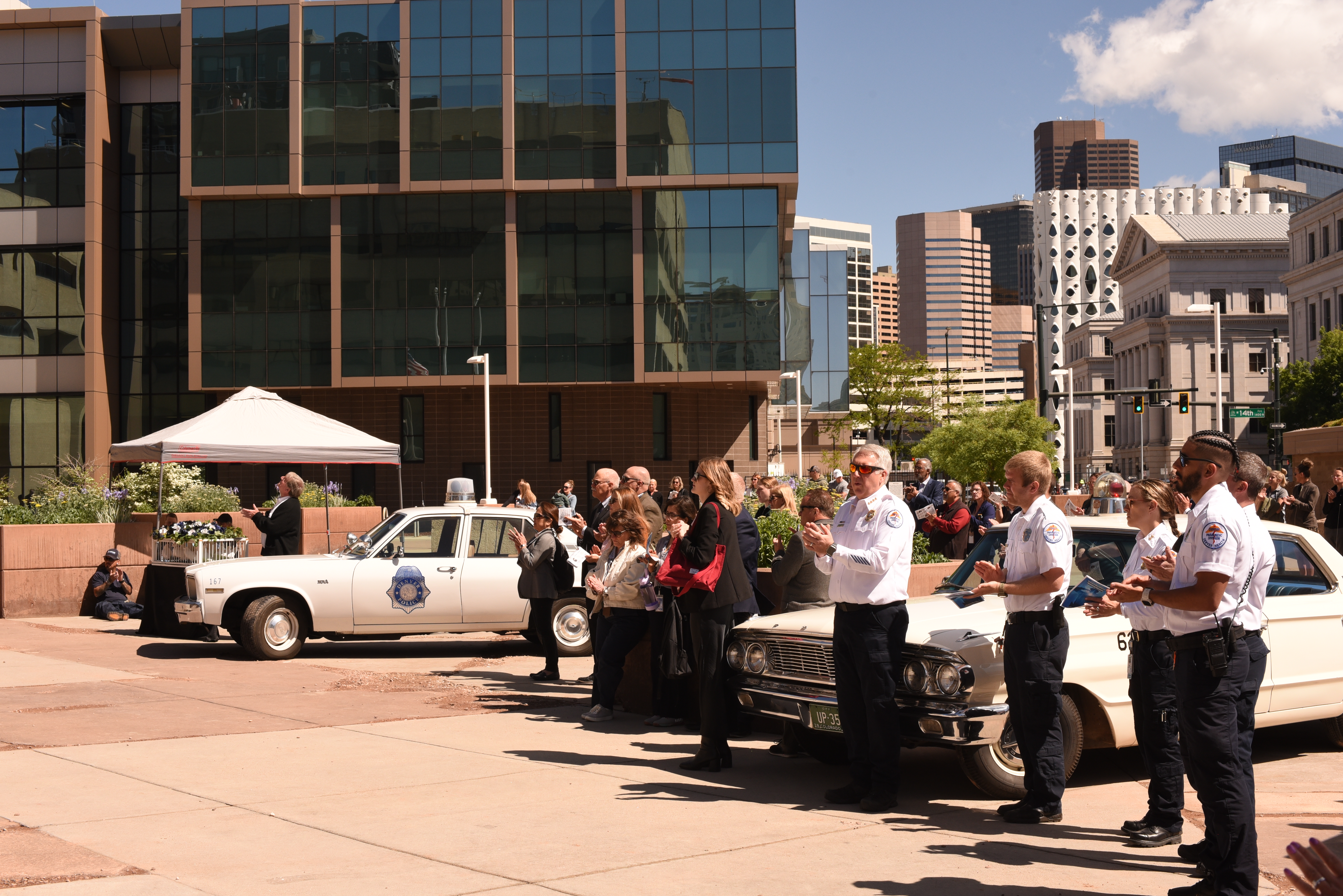 People in the audience applaud after a speech during the Denver Police Department's fallen officers memorial ceremony on Thursday, May 15. (Michael Braithwaite / The Denver Gazette) (MichaelBraithwaiteBreaking News Reportermichael.braithwaite@gazette.comhttps://secure.gravatar.com/avatar/fb3f78e3ce4a645001819087b4b73d25?d=mm&r=g)