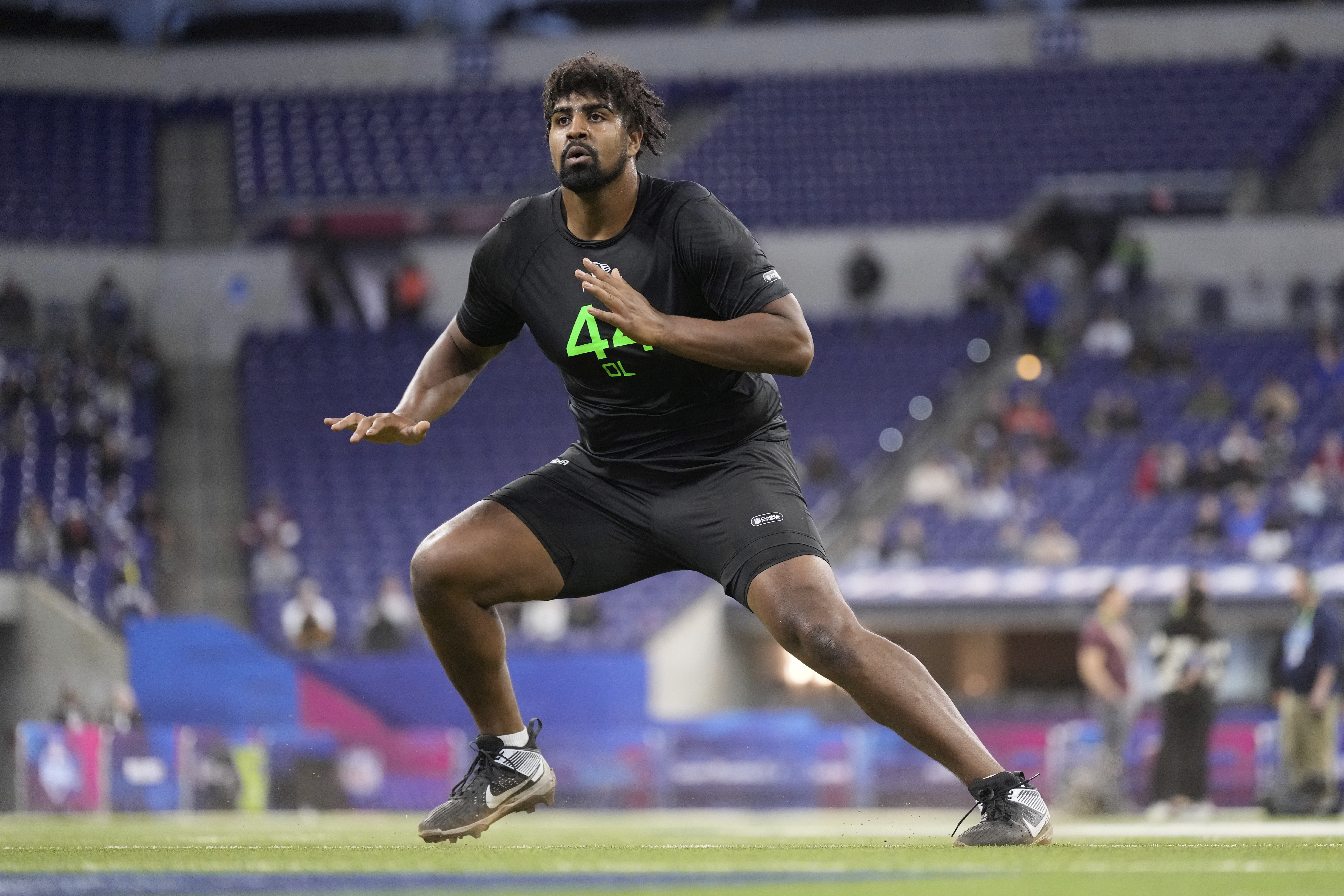 Georgia offensive lineman Xavier Truss runs a drill at the NFL football scouting combine in Indianapolis, Sunday, March 2, 2025. (AP Photo/George Walker IV) (George Walker IV)