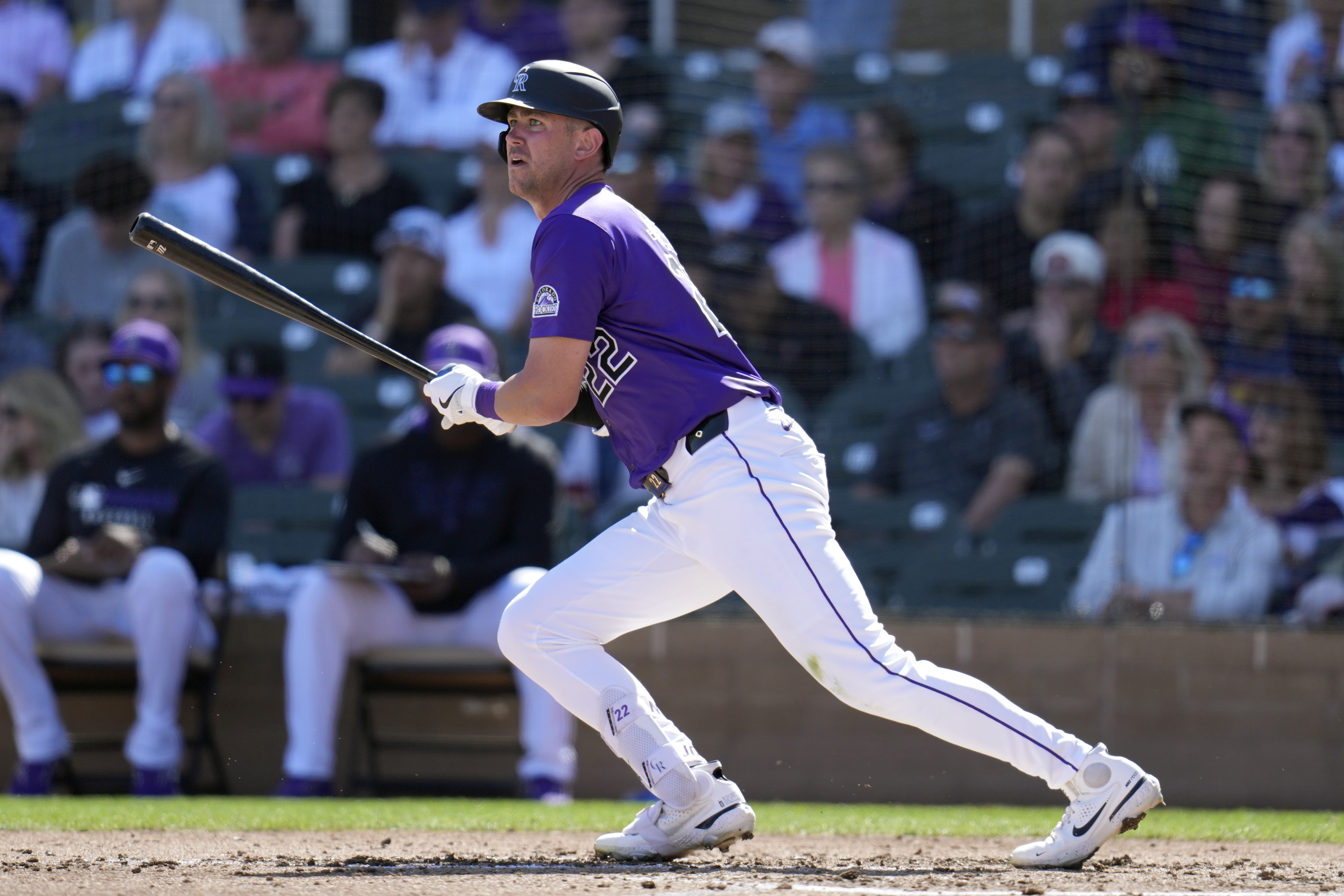 Colorado Rockies' Nolan Jones watches the flight of a fly ball during the third inning of a spring training baseball game against the Seattle Mariners Sunday, March 2, 2025, in Scottsdale, Ariz. (AP Photo/Ross D. Franklin) (Ross D. Franklin)