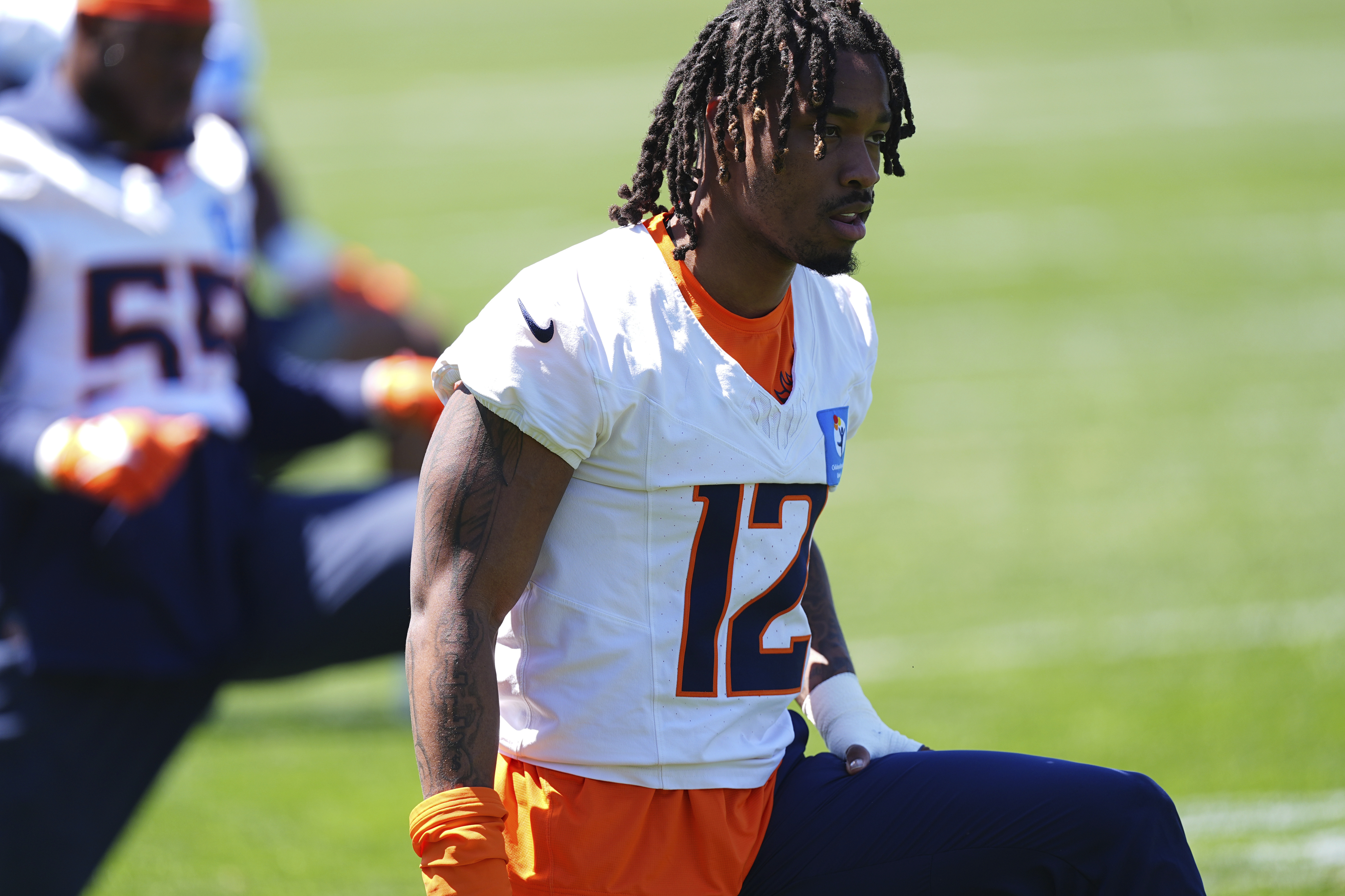 Denver Broncos cornerback Jahdae Barron stretches during the NFL football team's rookie minicamp at the Broncos' headquarters Saturday, May 10, 2025, in Centennial, Colo. (AP Photo/David Zalubowski) (David Zalubowski)