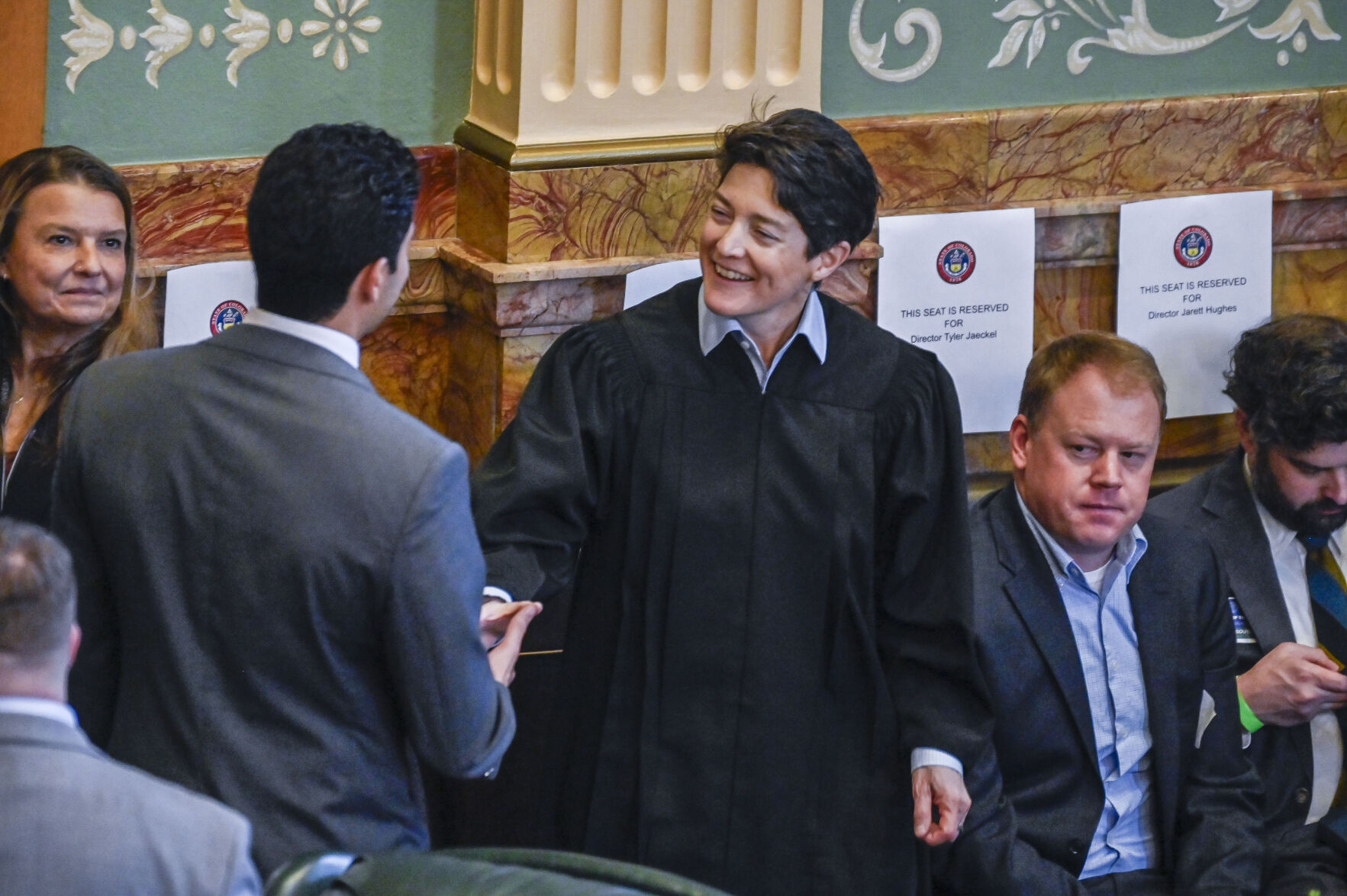 Chief Justice Monica M. Márquez greets an attendee of Gov. Jared Polis' 2025 State of the State address on Thursday January 9, 2025 at the Colorado State Capitol. Special to Colorado Politics/John Leyba (John Leyba)