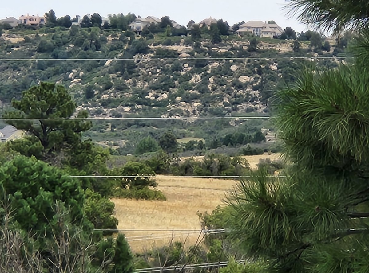 FILE PHOTO: A overhead view of Pine Canyon ranch splitting the Town of Castle Rock in unincorporated Douglas County. This photo was taken by Greg Larson, a neighbor of the proposed development who, among many others in the area, oppose a plan that would redevelop the land for more homes, open space and a new renewable water system. (Courtesy photo, Greg Larson)