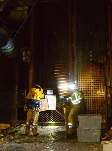 Uranium miners unload steel grates at the Pinyon Plain Mine.jpg (copy) (copy) (copy)