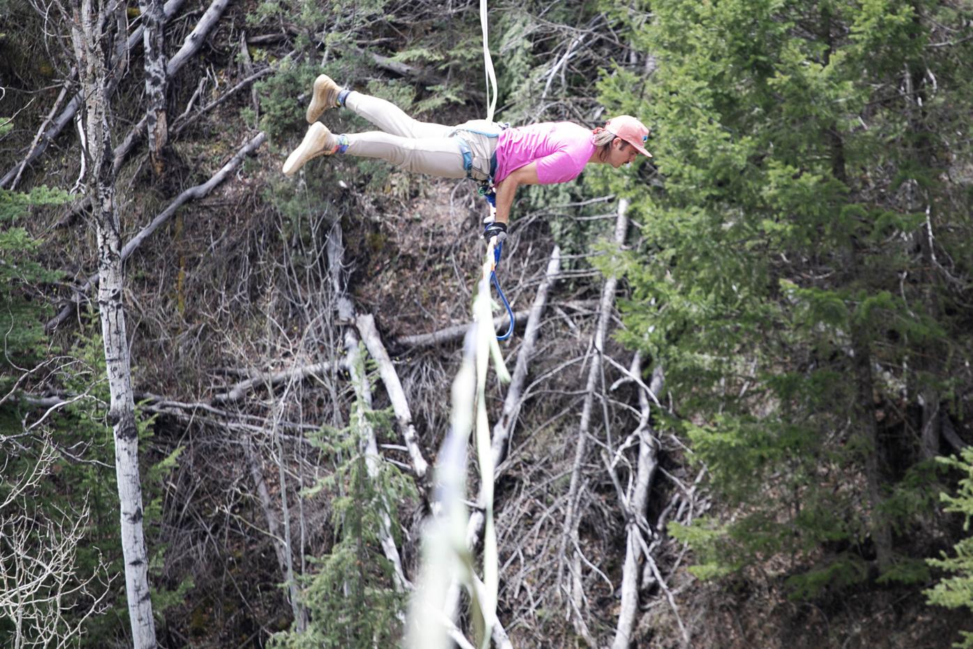 Davis Hermes works his way across a highline southwest of Edwards
