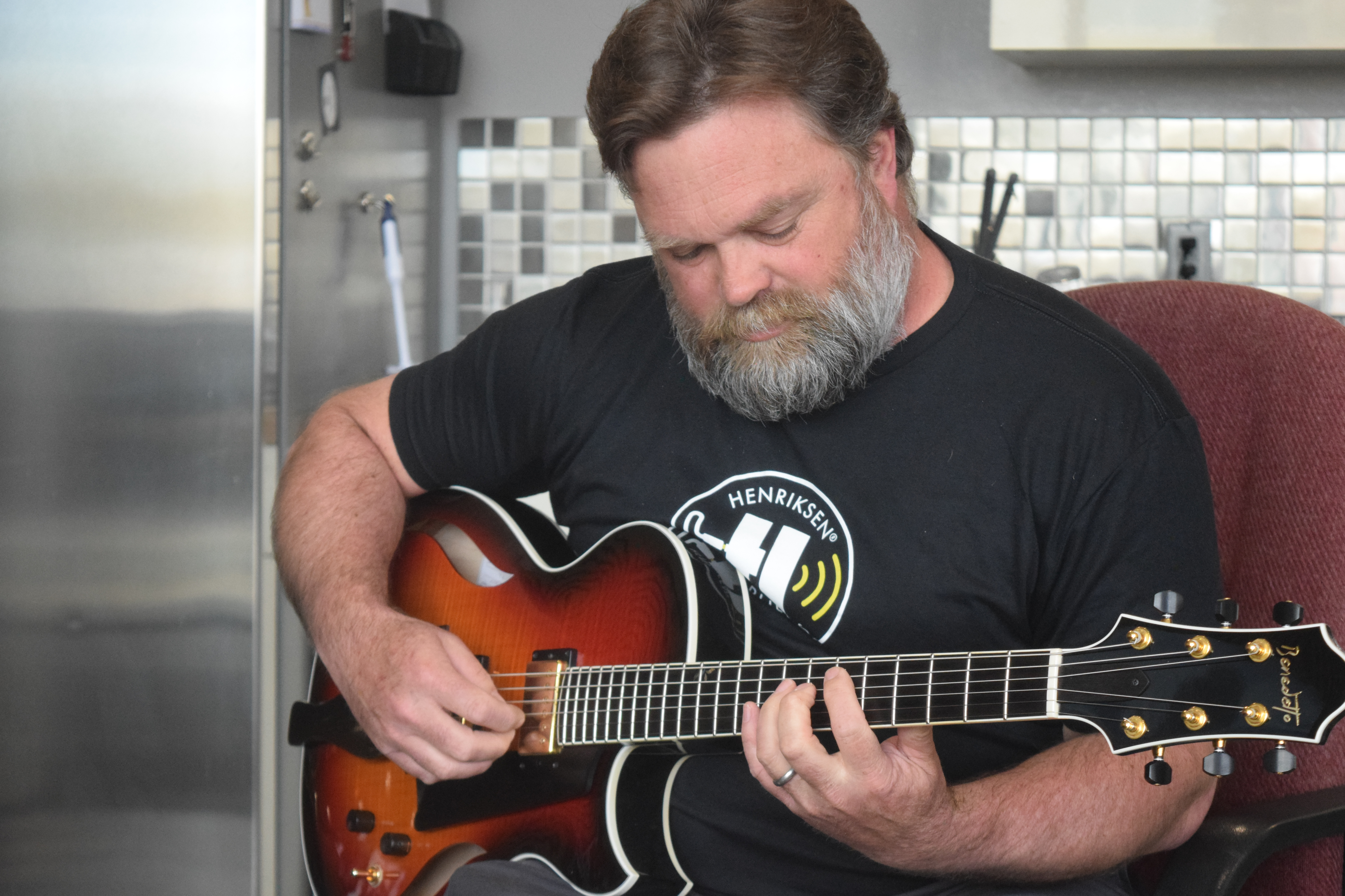 Peter Henriksen, owner of Henriksen Amplifiers, showing off the Bud Amplifier model at the company's headquarters in Arvada. The small, professional amp is named after his father who originally came up with the amp's schematics. (SageKelleyJefferson County Reportersage.kelley@denvergazette.comhttps://denvergazette.com/content/tncms/avatars/e/5f/457/e5f45740-2717-11ee-85b2-ab80f2d36252.5b966c1d2ce4987987665d57c237eda4.png)