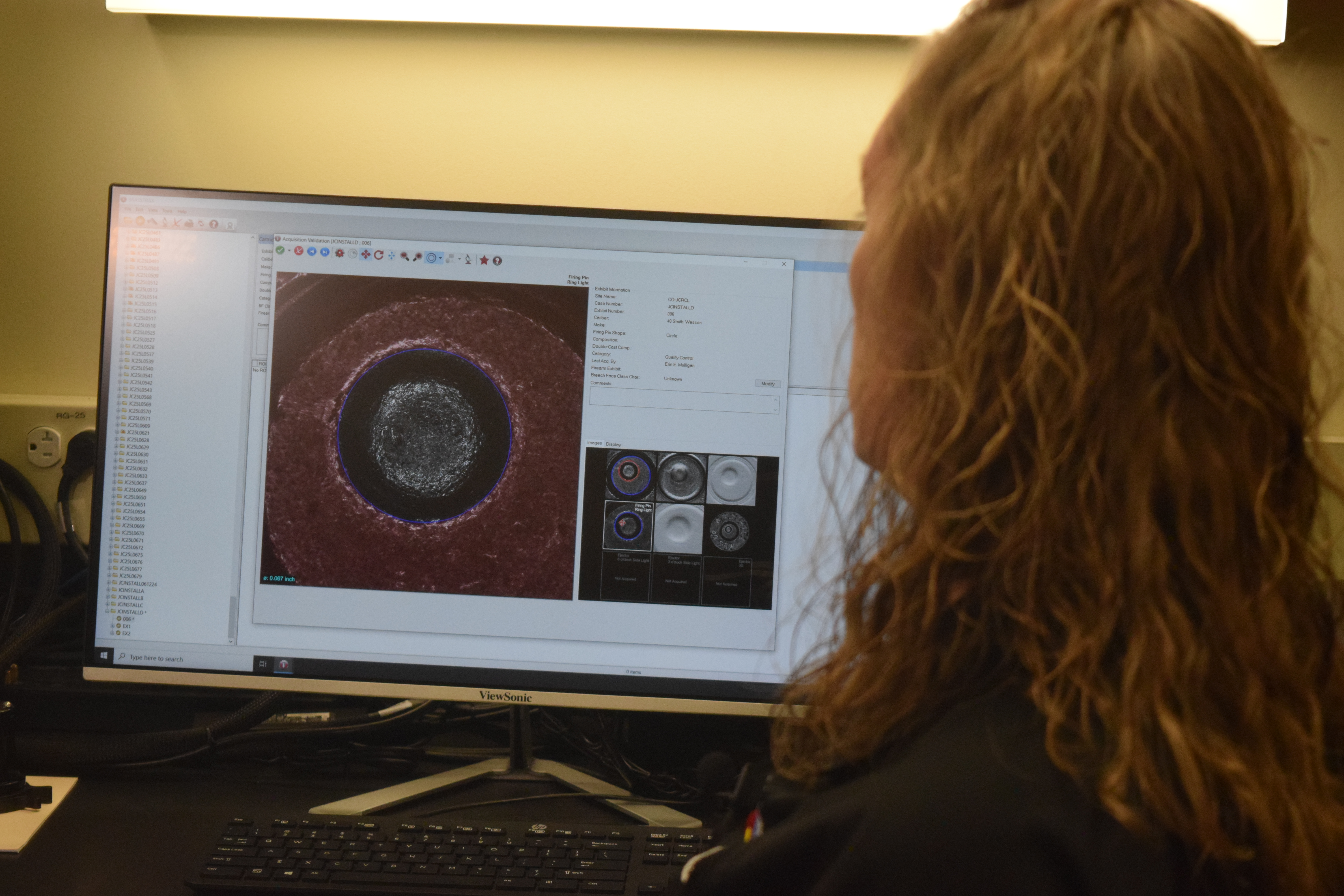 Erin Mulligan, Jefferson County Regional Lab forensic scientist, shows off a test image of an ammunition casing in the new National Integrated Ballistic Information Network (NIBIN) BrassTrax machine. While the NIBIN has been able to provide 2D images of casings since 2003, the new machine renders it fully in 3D, allowing investigators to look at grooves and depth. (SageKelleyJefferson County Reportersage.kelley@denvergazette.comhttps://denvergazette.com/content/tncms/avatars/e/5f/457/e5f45740-2717-11ee-85b2-ab80f2d36252.5b966c1d2ce4987987665d57c237eda4.png)