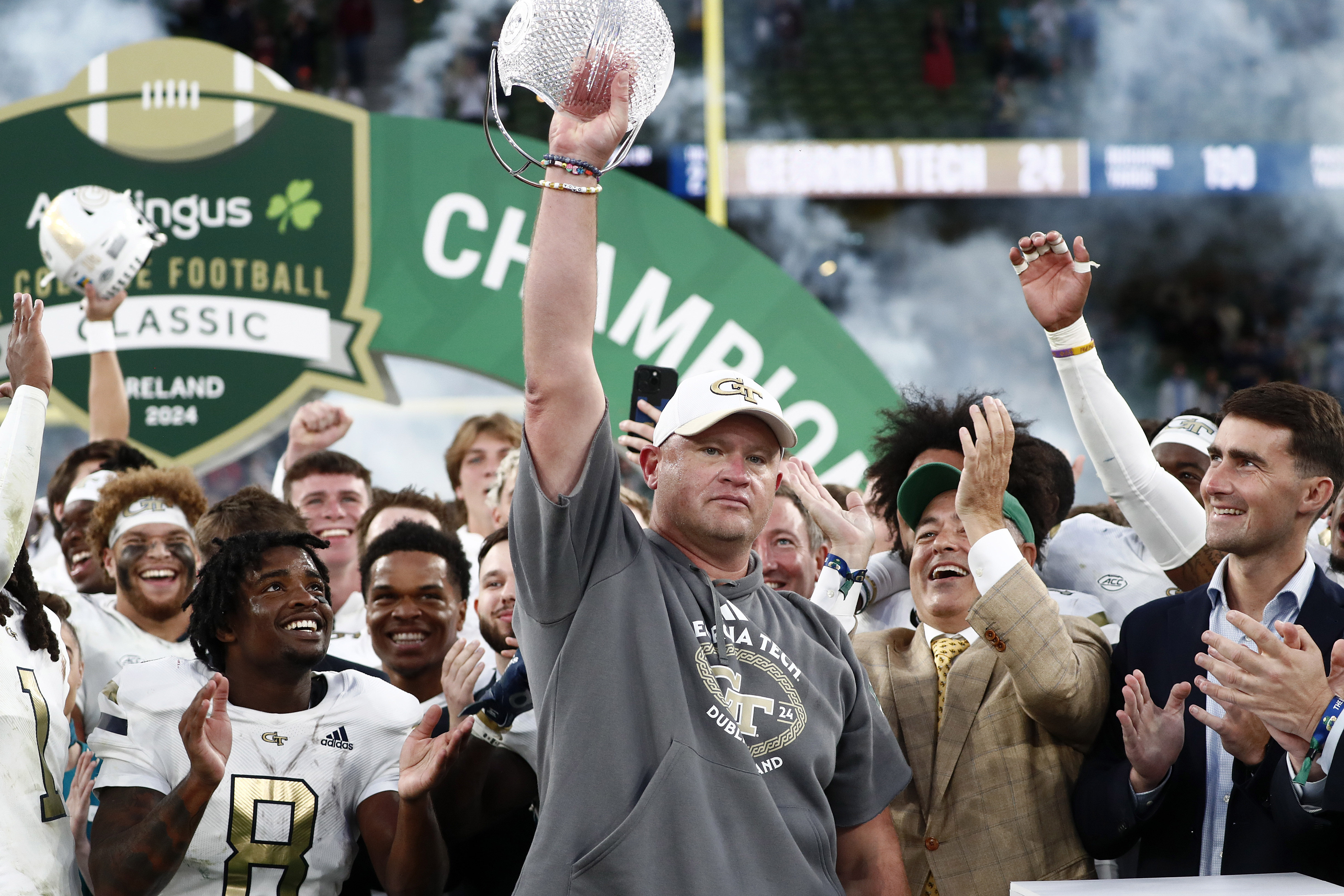 Georgia Tech head coach Brent Key celebrates with his team after the NCAA college football game between Georgia Tech and Florida State at the Aviva stadium in Dublin, Saturday, Aug. 24, 2024. (AP Photo/Peter Morrison) (Peter Morrison)
