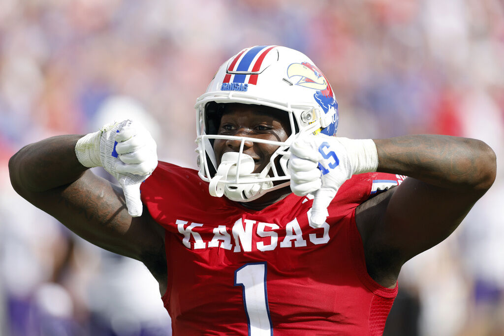 Kansas linebacker JB Brown (1) reacts after sacking TCU quarterback Josh Hoover (10) during the first half of an NCAA football game on Saturday, Sept. 28, 2024, in Kansas City, Mo. (AP Photo/Colin E. Braley) (Colin Braley)