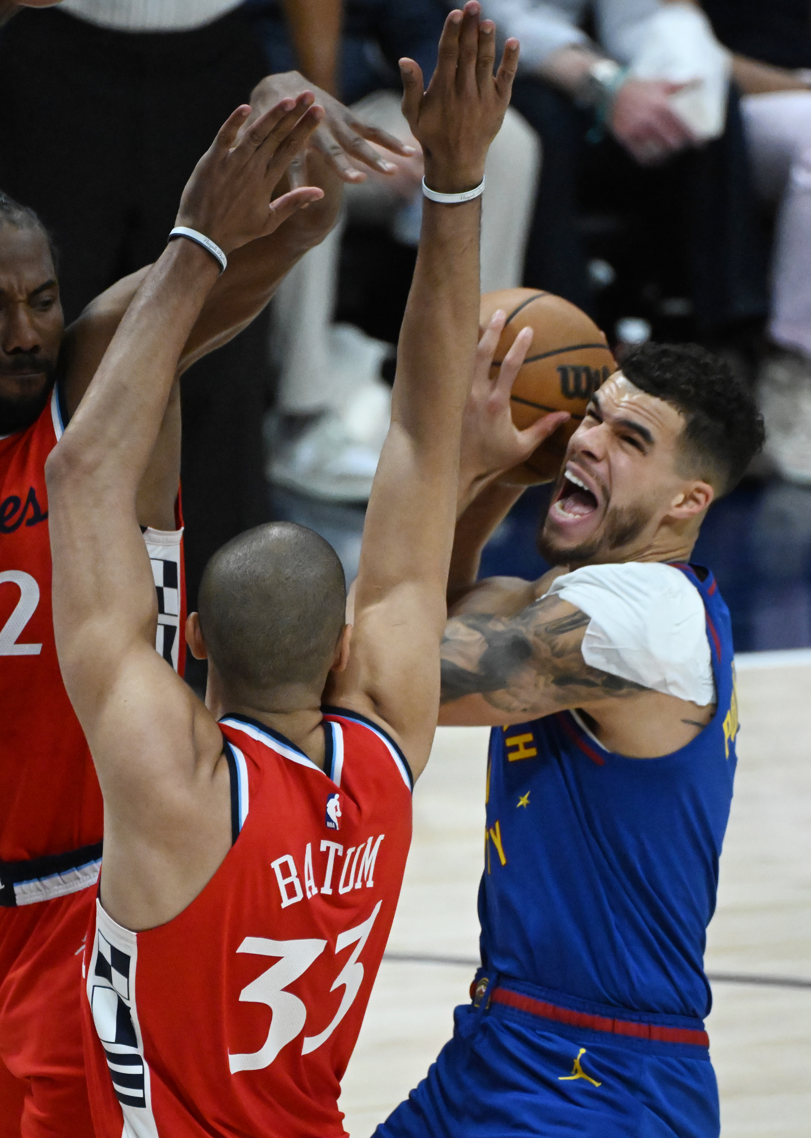Denver Nuggets forward Michael Porter Jr. (1) goes up for a basket over LA Clippers forward Nicolas Batum (33) during the first quarter of game 7 against the Clippers in the first round of the Western Conference Championship on Saturday, May 3, 2025 at Ball Arena. (Jerilee Bennett,The Gazette)