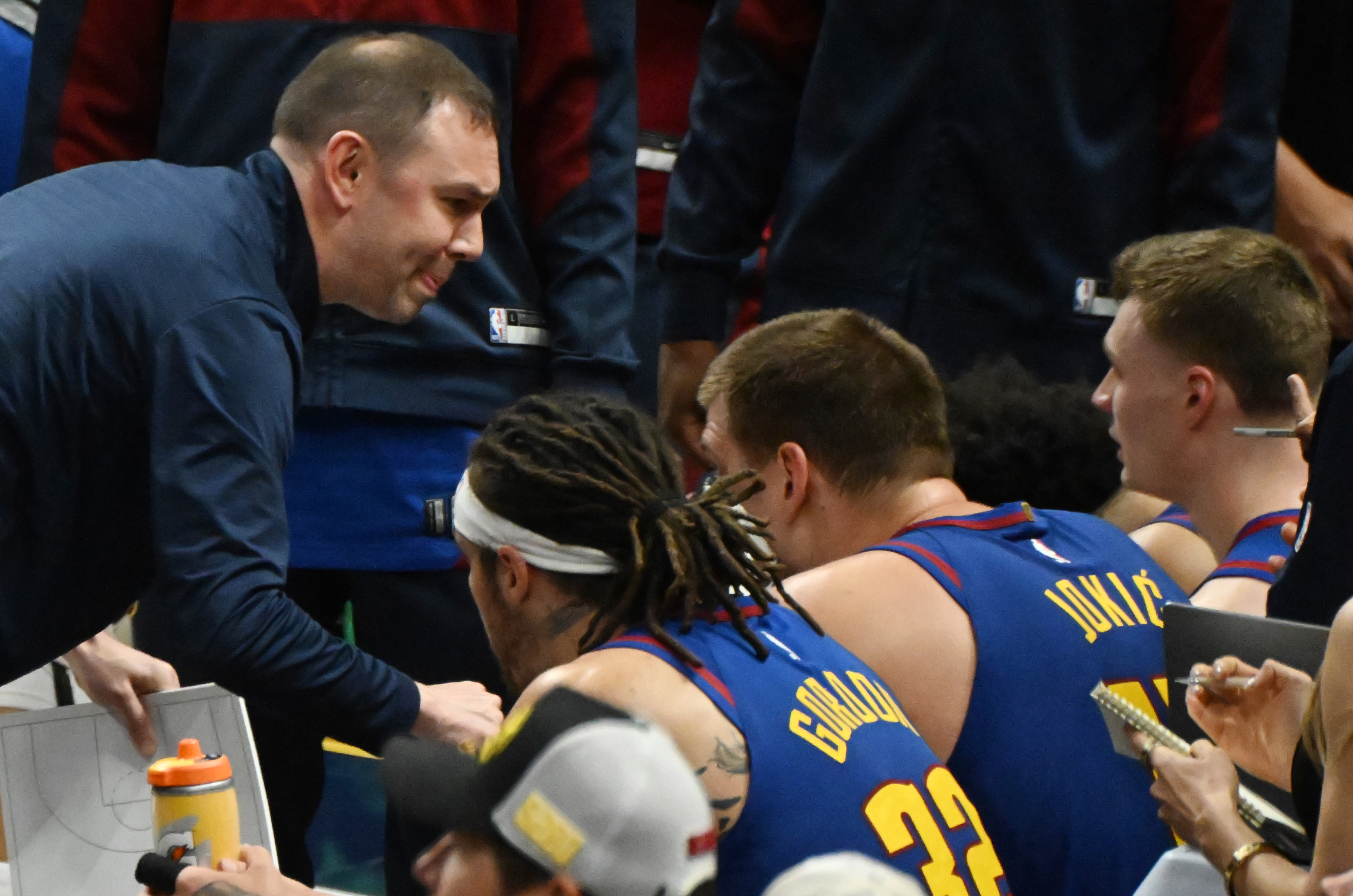 Nuggets interim coach David Adelman talks to the players during timeout in overtime of game 3 of round 2 of the Western Conference Championship at Ball Arena on Friday, May 9, 2025. The Nuggets won the game 113-104. (Jerilee Bennett, The Denver Gazette)