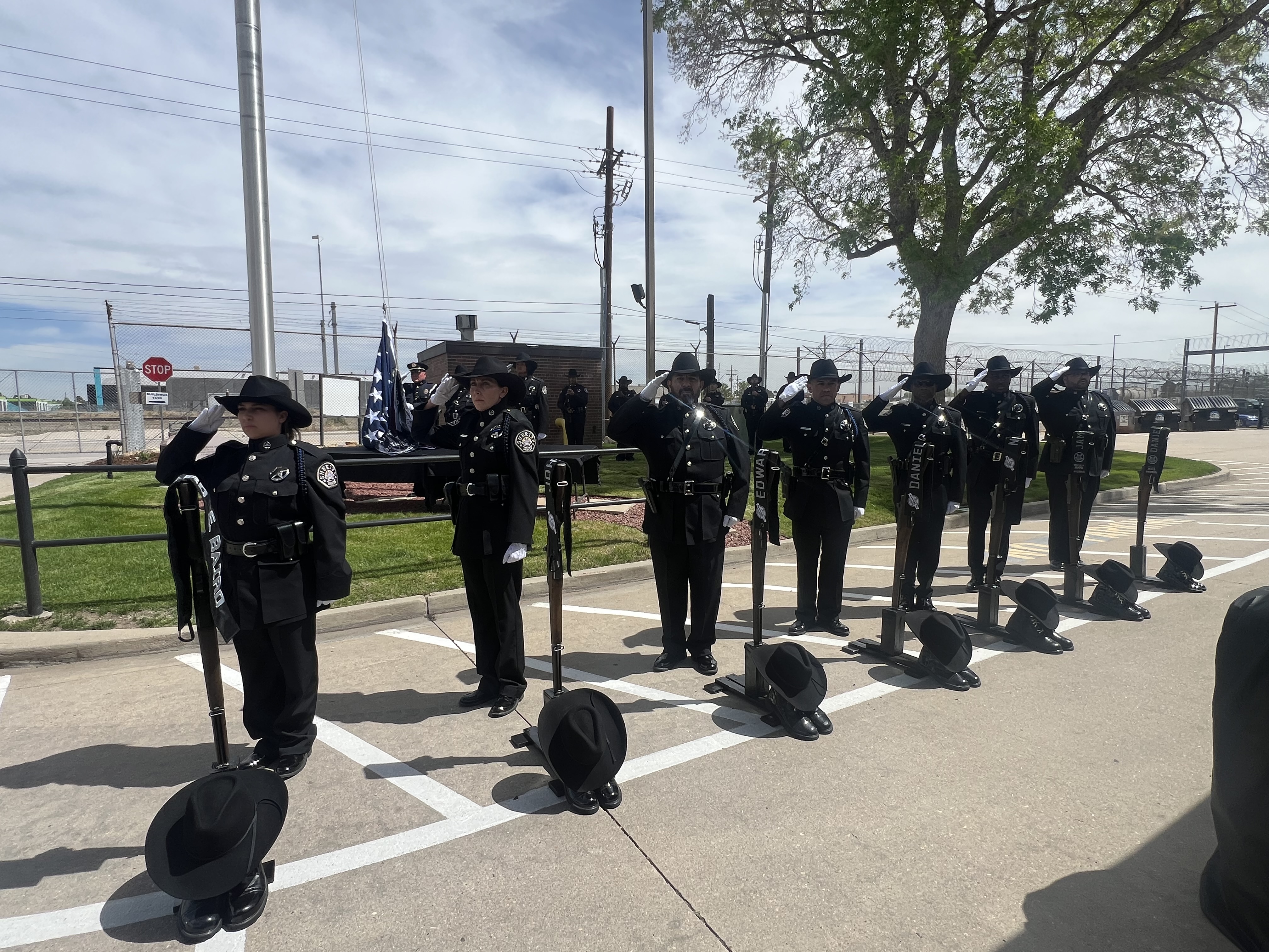 Denver Sheriff's Department deputies salute during the fallen officers memorial Tuesday in Denver. (Courtesy photo, Denver Sheriff's Department)