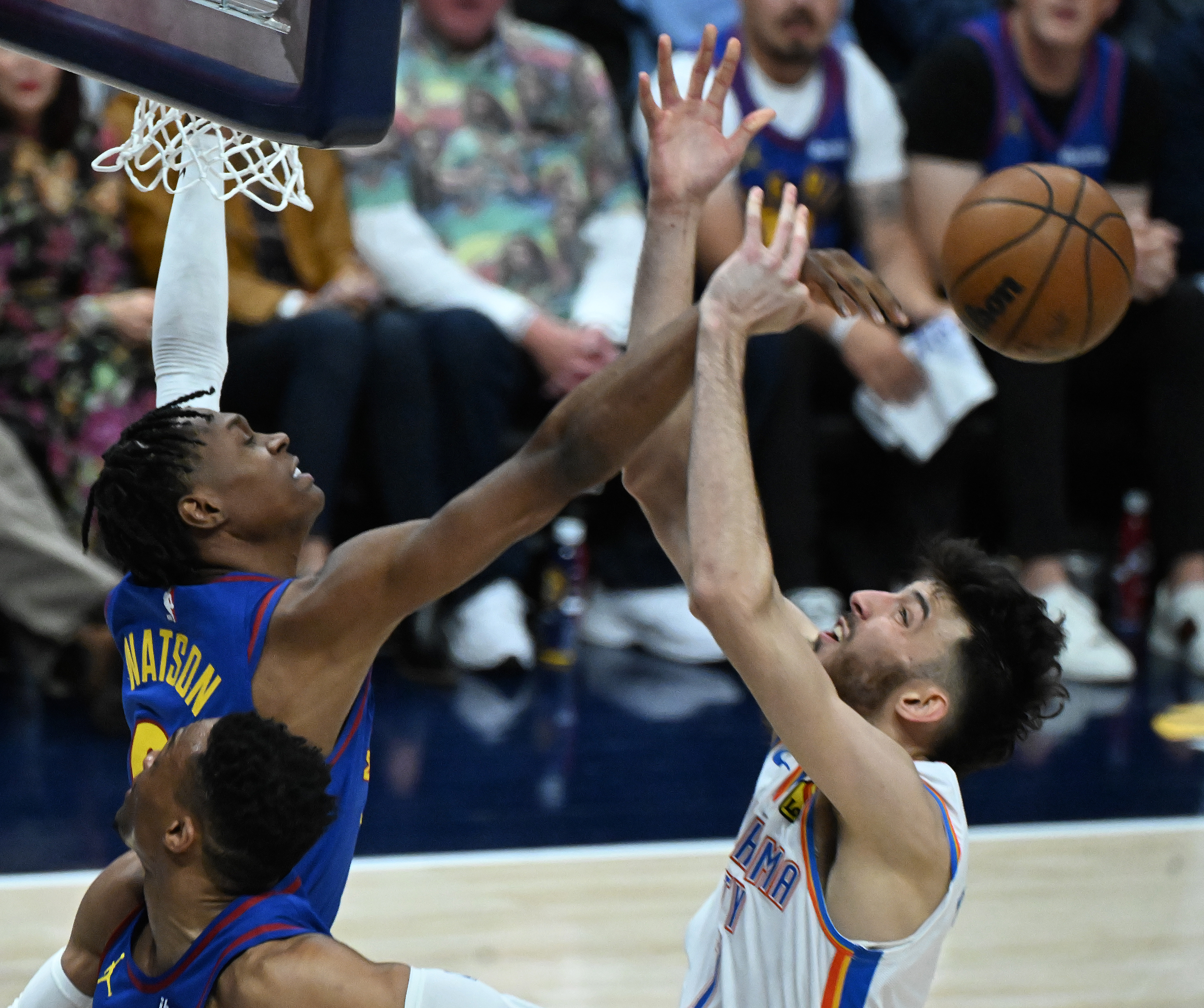 Denver Nuggets forward Peyton Watson (8) blocks the shot of Oklahoma City Thunder forward Chet Holmgren (7) during the 3rd quarter of game 3 of round 2 of the Western Conference Championship at Ball Arena on Friday, May 9, 2025. (Jerilee Bennett,The Gazette)