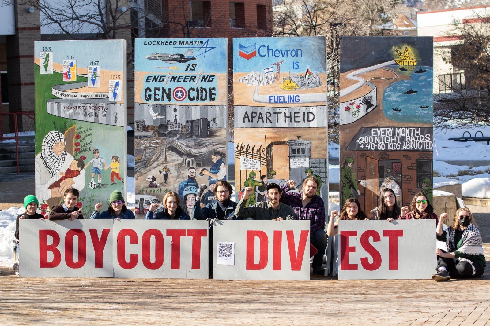 Colorado School of Mines Students for a Democratic Society (Mines SDS) and Orediggers Against Apartheid (OAA) pose with their exhibit, “Engineering Genocide,” opposing the Israeli actions against Palestine during the Mines Career Fair on Jan. 28. (Courtesy of Sara Hertwig and Eric Gross)