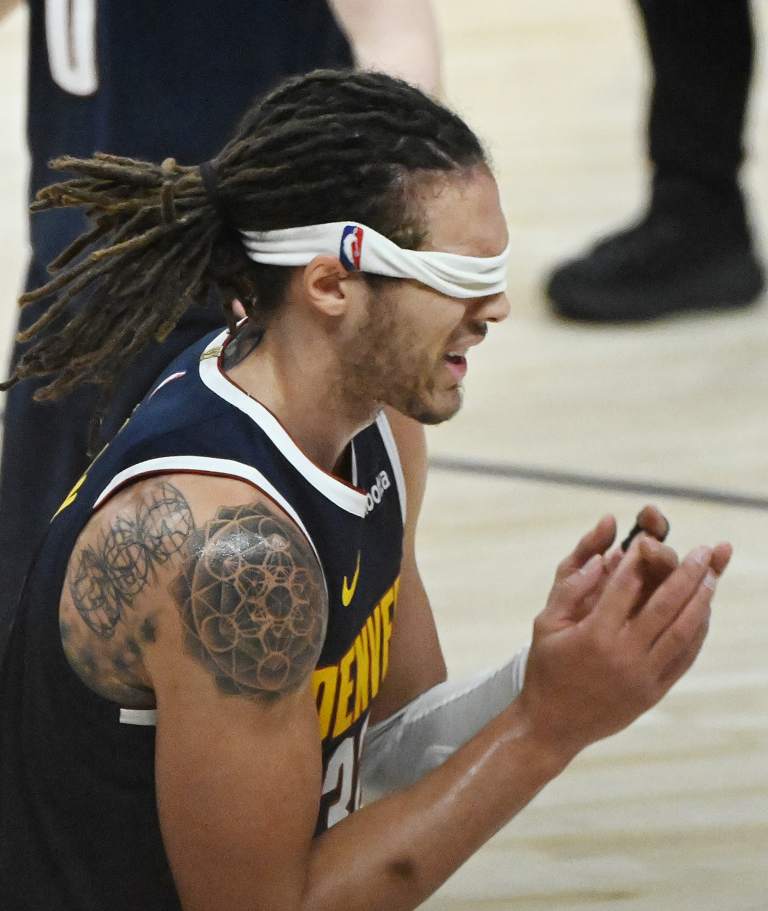Denver Nuggets forward Aaron Gordon (32) pulls his headband over his eyes in frustration after a foul call as he pleads with the referee during the 4th quarter of game 4 of the second round of the Western Conference Championship at Ball Arena on Sunday, May 11, 2025. (Jerilee Bennett,The Gazette)
