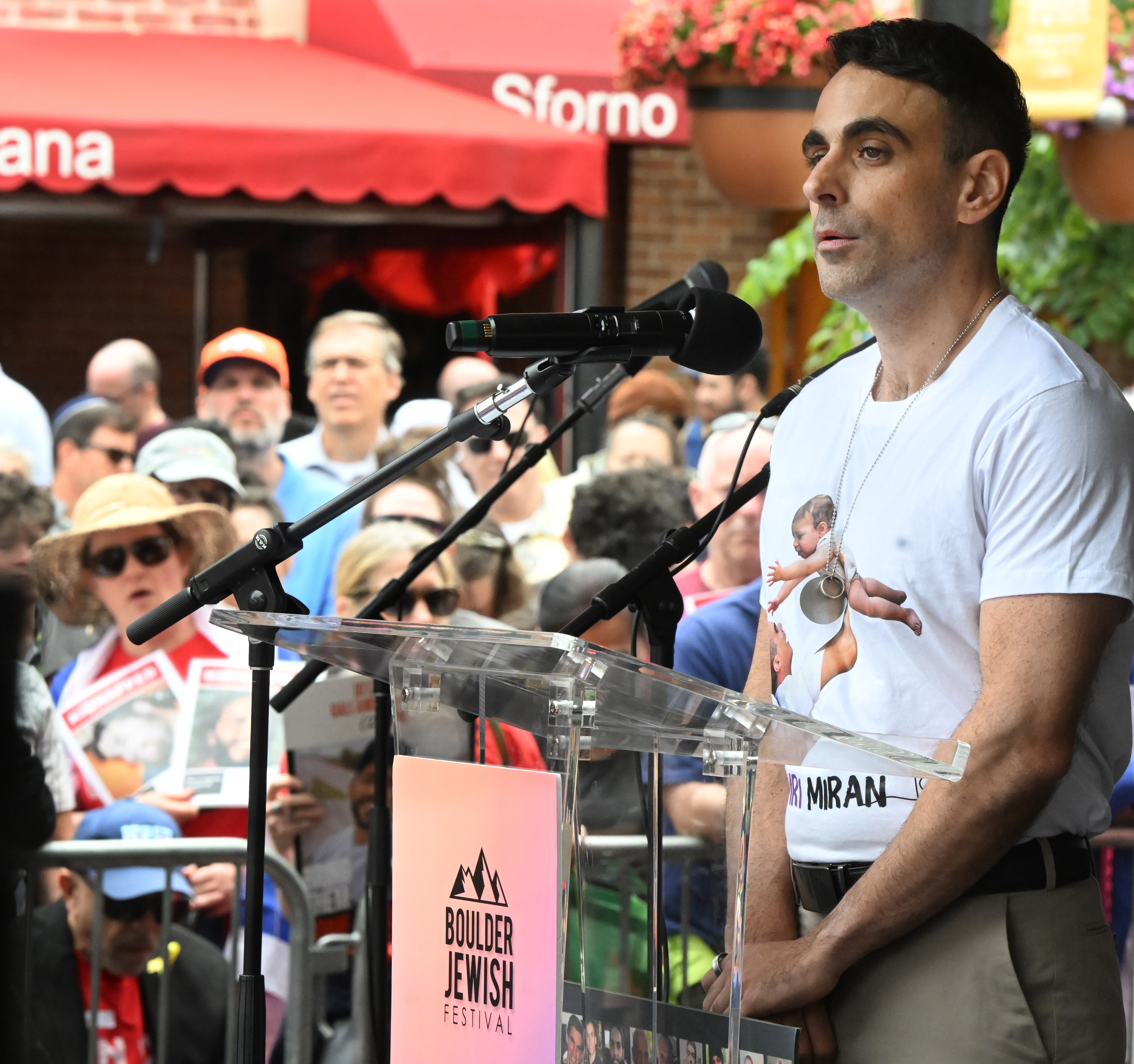 Moshe Lavi, whose brother-in-law Omri Miran, is a hostage, addresses a crowd of hundreds after participating in the Run For Their Lives walk on the Pearl Street Mall in Boulder on Sunday, June 8, 2025 . They walked in the same location as last week along the Pearl Street Mall on Sunday, June 8, 2025. Last weeks walk ended with a man using makeshift molotov cocktails to set the peaceful protesters on fire. The walk has been held every week in cities around the country to make sure that the hostages in Gaza, that were taken on Oct. 7, 2023, are not forgotten.