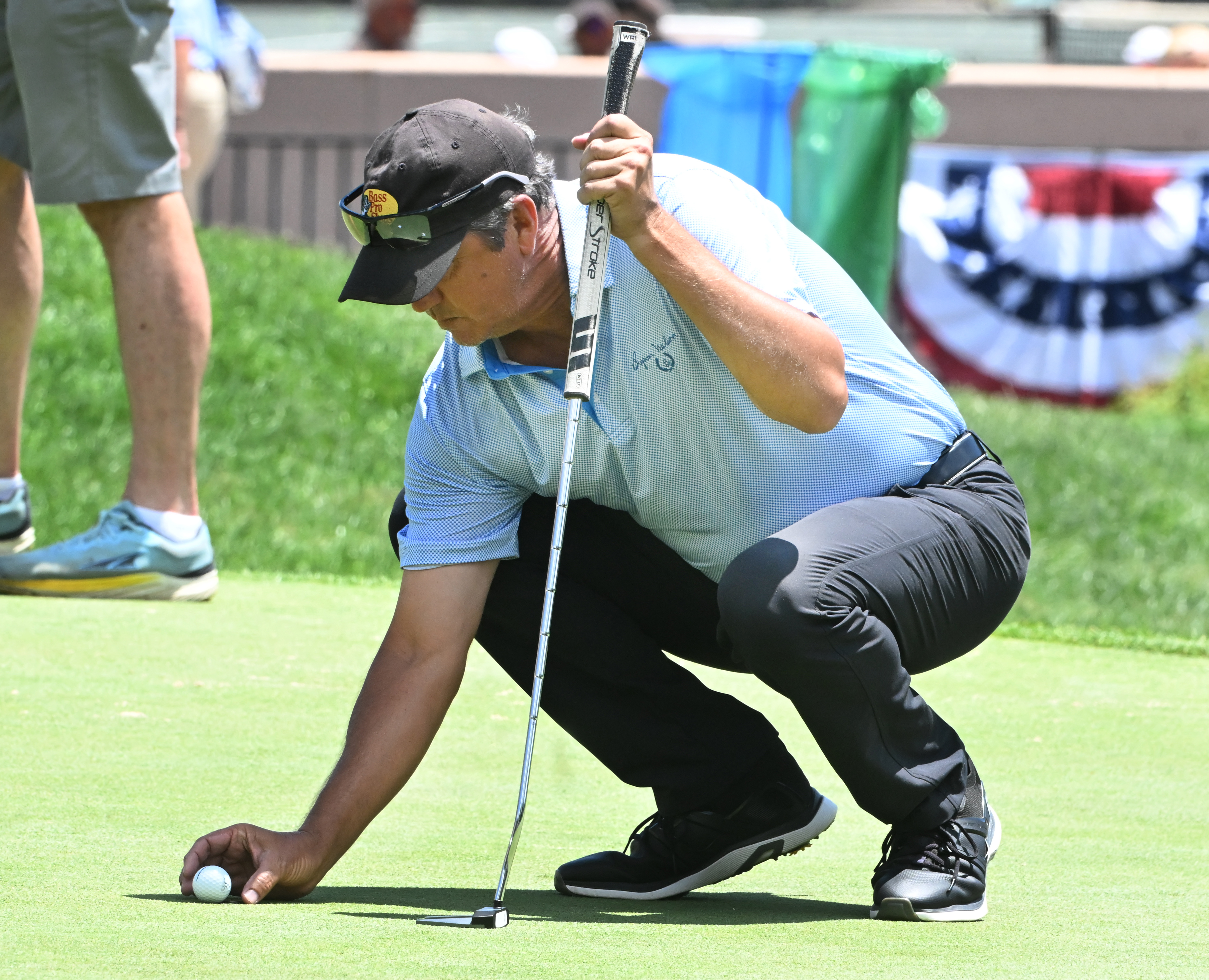 Shane Bertsch from Parker, Colorado lines up a putt on the 18th hole during the first session of the first day of play at the U.S. Senior Open Championship at the Broadmoor Golf Club on Thursday, June 26, 2025.