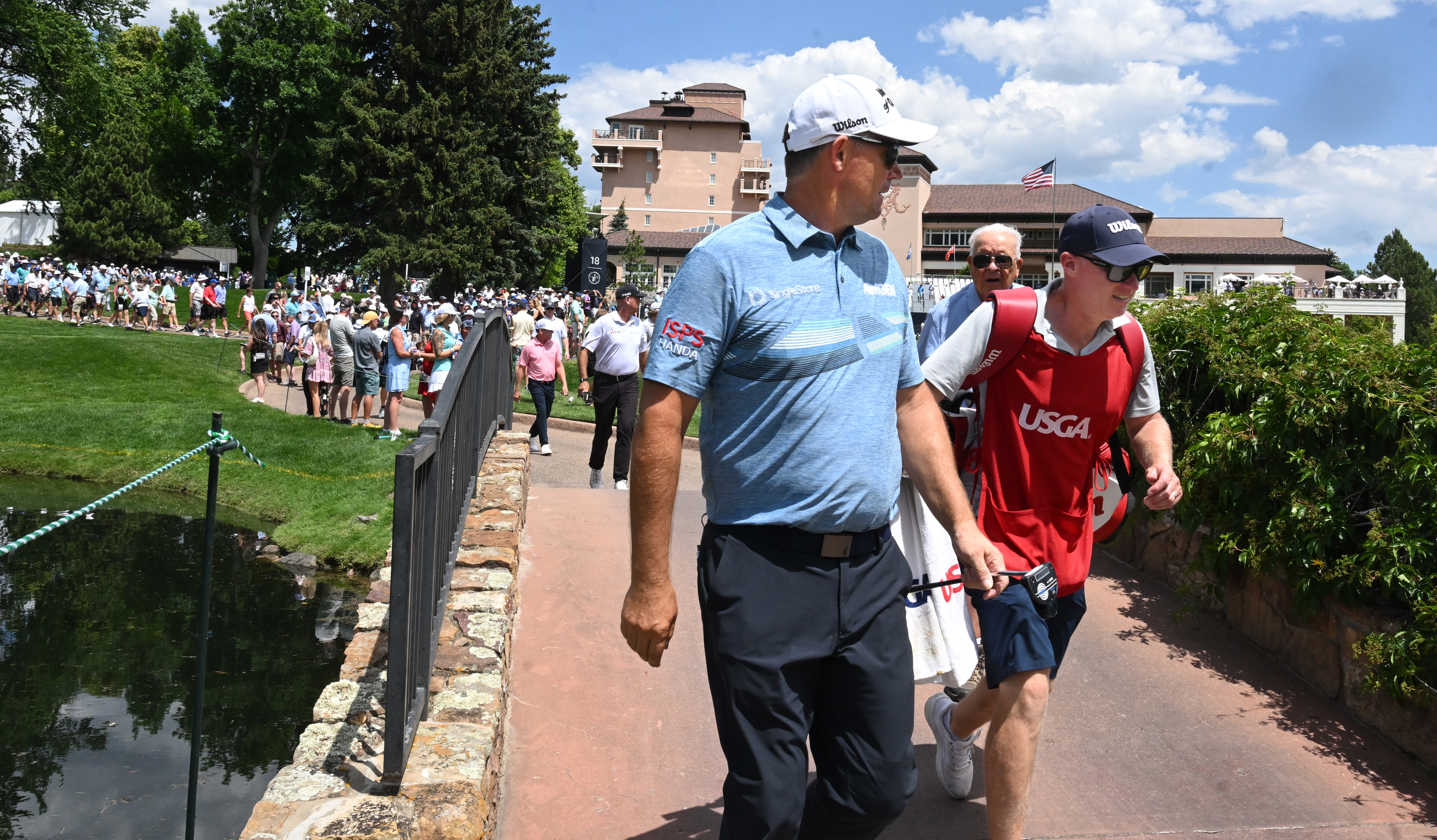 Padraig Harrington is followed by the crowd after teeing off on the 6th hole at the U.S. Senior Open Championship at the Broadmoor Golf Club on Friday, June 27, 2025. This was the second day of competition being held in Colorado Springs, Colorado. Halfway through the day Harrington and Cink were tied for first place at -6. (Jerilee Bennett,The Gazette)
