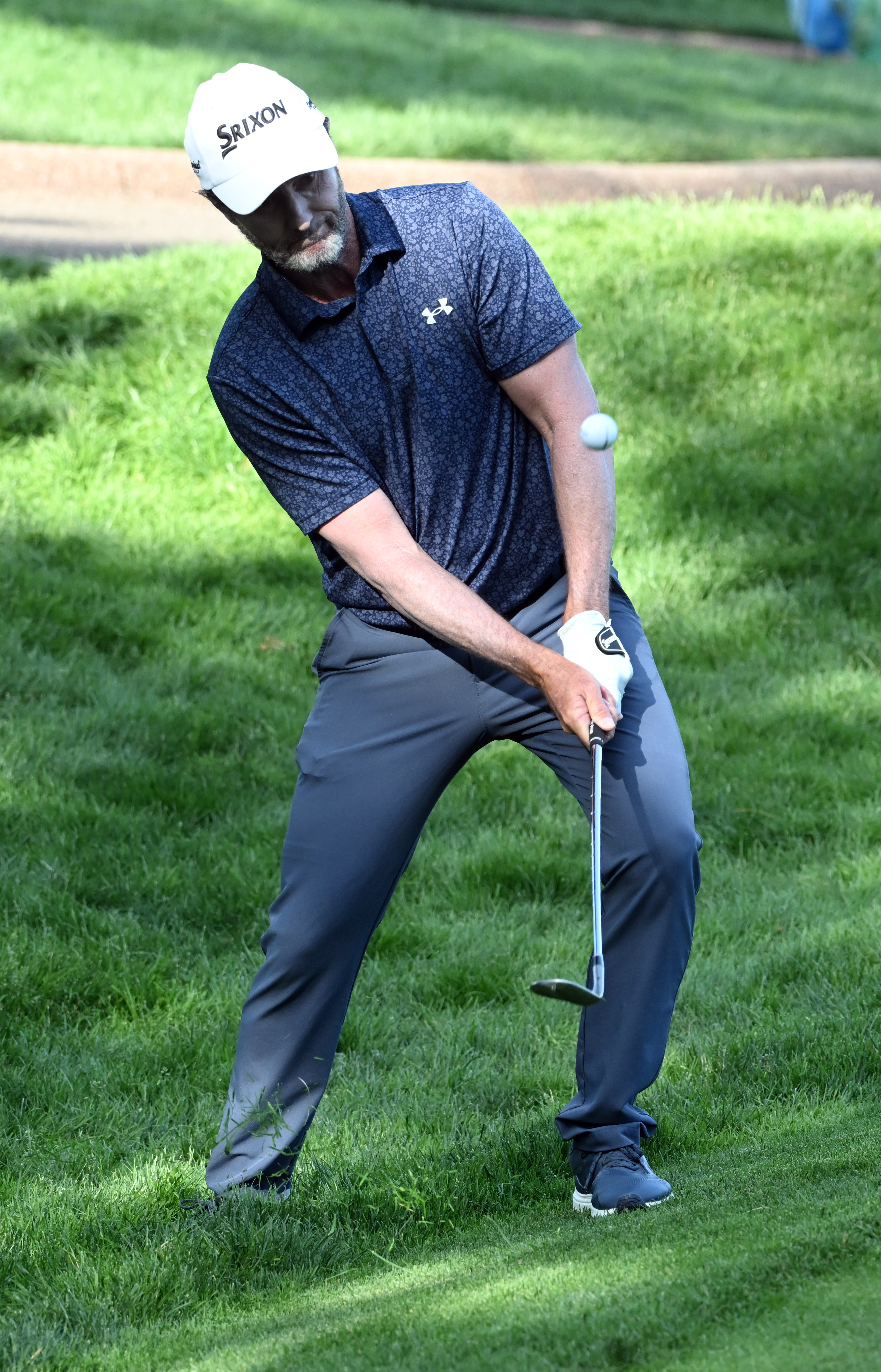 Mark Hensby chips onto the green of hole 3 on day 2 of the U.S. Senior Open Championship at the Broadmoor Golf Club in Colorado Springs, Colorado on Friday, June 27, 2025. (Jerilee Bennett,The Gazette)