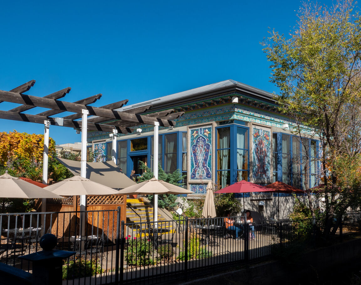 Outdoor dining at the Dushanbe Teahouse on 13th Street in downtown Boulder, Colorado. Photo Credit: raclro (iStock).