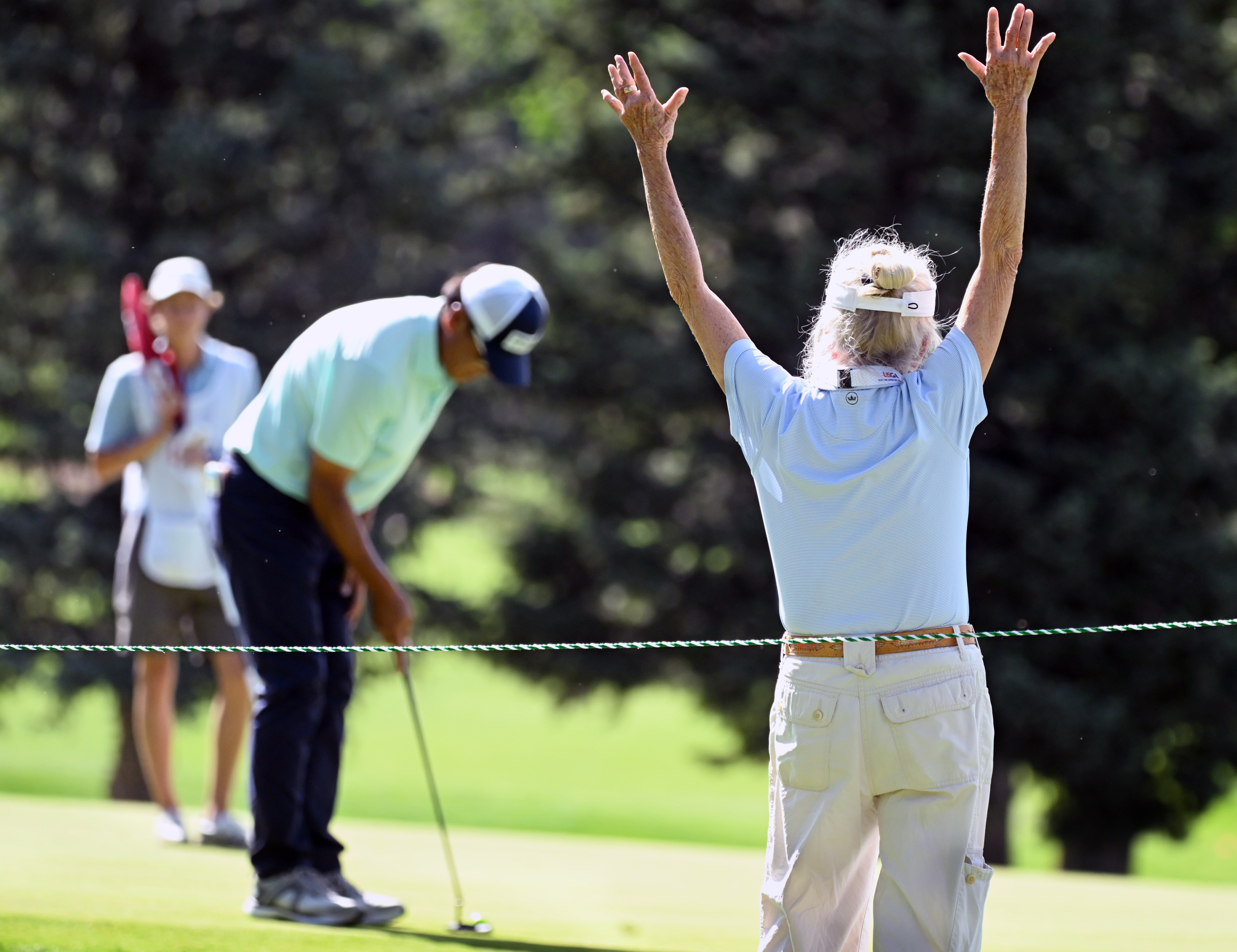 One of the jobs of a volunteer is to keep the crowd quiet during a putt. This volunteer was working on the 6th hole on day 2 of the U.S. Senior Open Championship at the Broadmoor Golf Club in Colorado Springs, Colorado on Friday, June 27, 2025. (Jerilee Bennett,The Gazette)