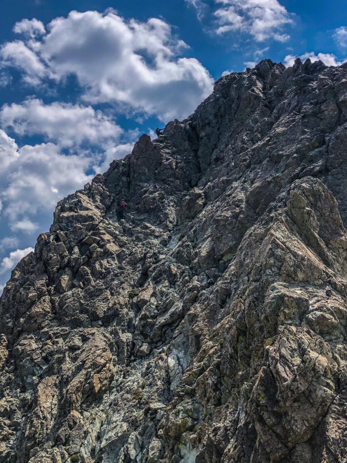 A look at climbers ascending the crux wall from the nearby knife edge. Photo Credit: Spencer McKee