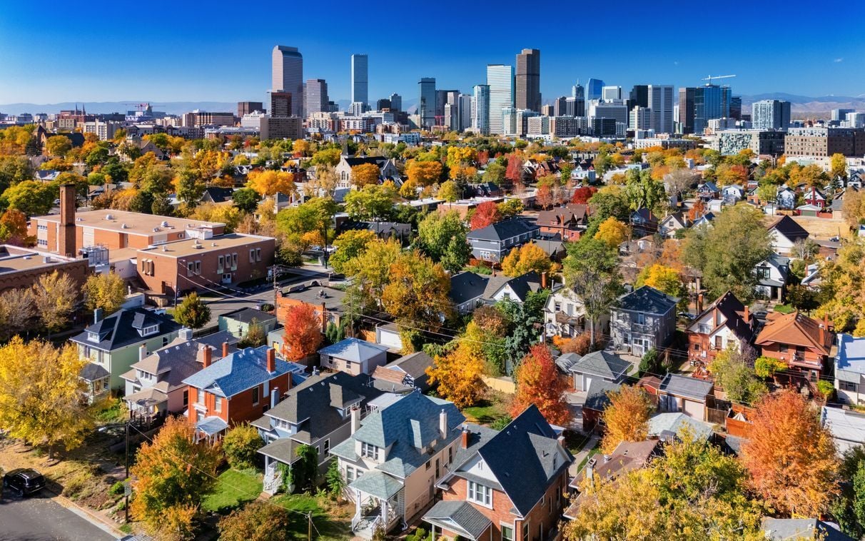 Denver Neighborhood Aerial In Autumn With Vibrant Colors And Skyline Photo Credit: Davel5957 (iStock). (copy)