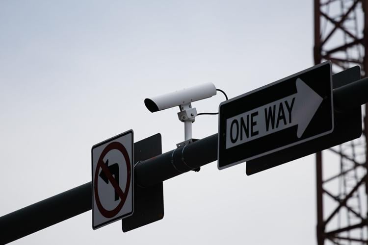 A surveillance camera sits at the intersection of Colfax and Downing (copy)