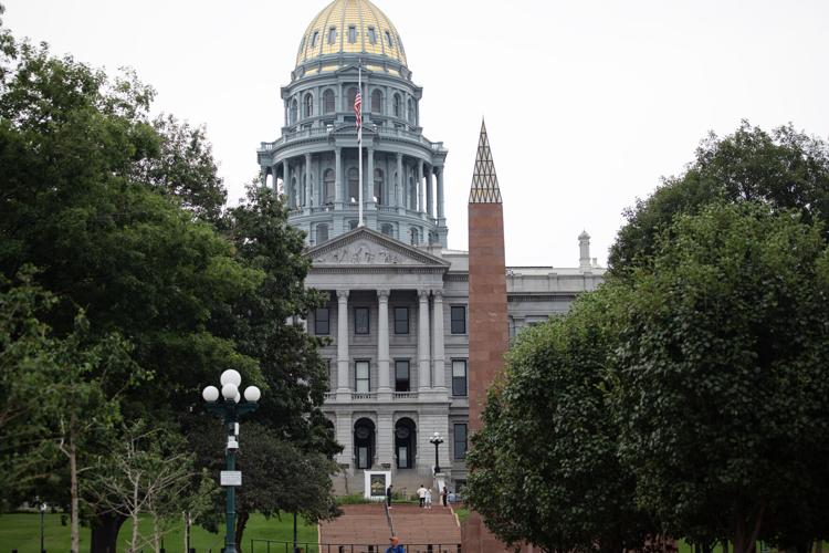The Colorado State Capitol overlooks the Colorado Veterans Monument