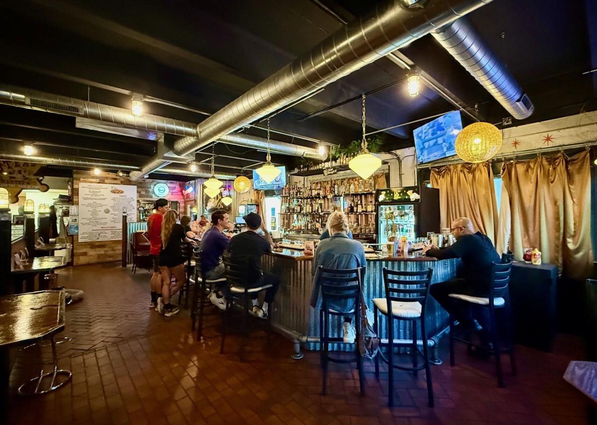 A shot of the interior of Bunzy's & Booze. This is the bar area, with additional restaurant-style seating available, too. Photo: Spencer McKee.