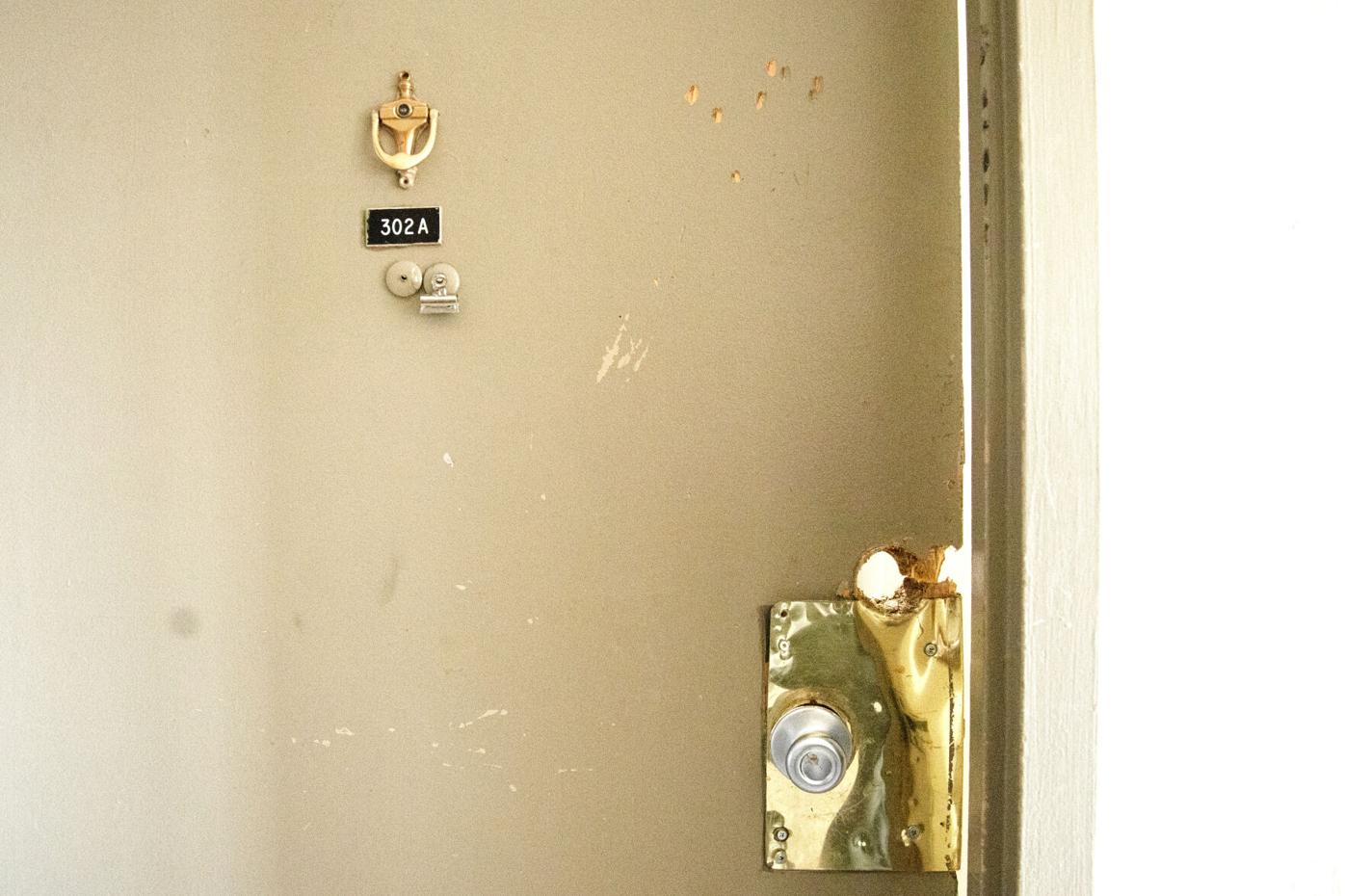 A door to an apartment union in Cedar Run Apartments was battering-rammed down during a federal raid