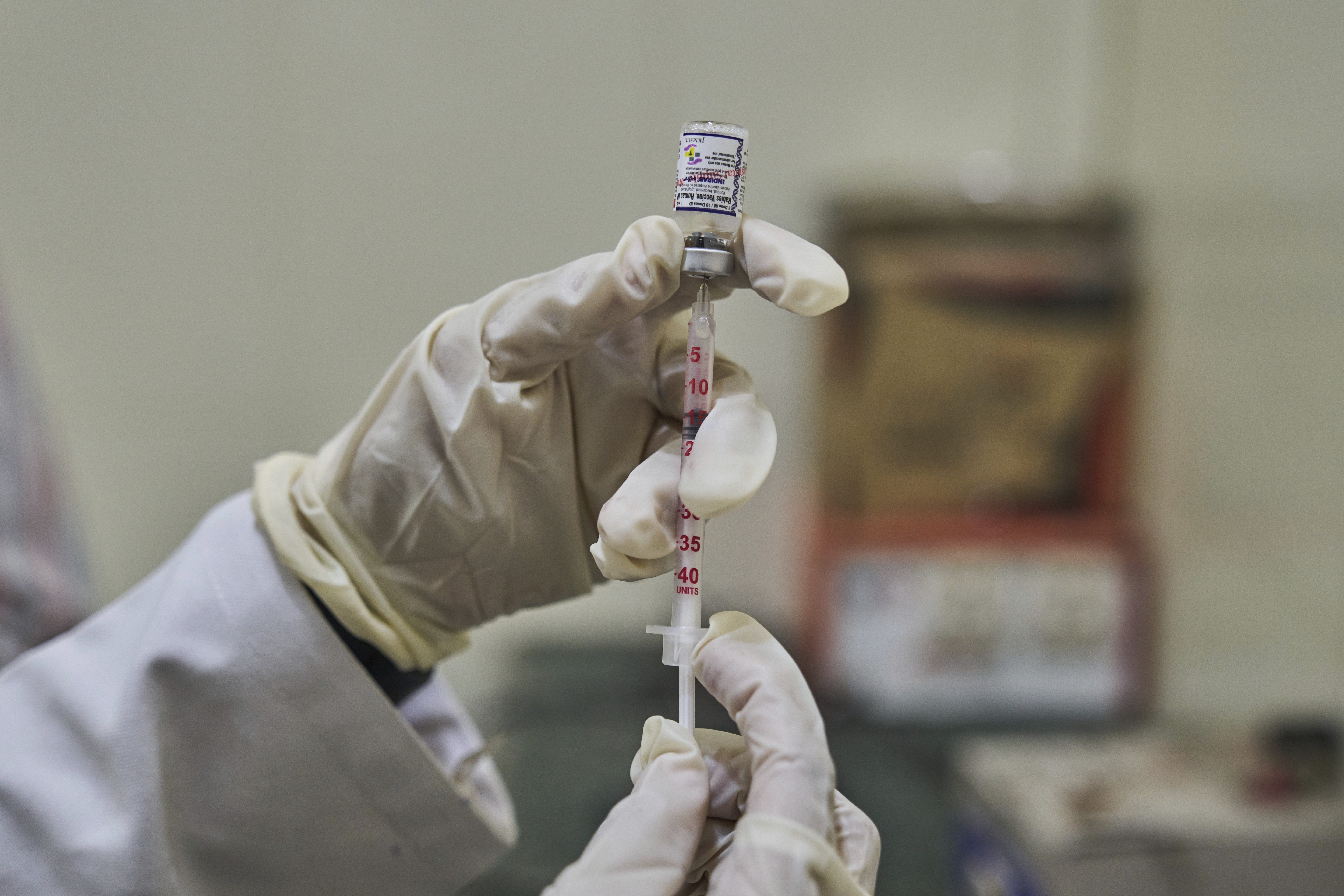 A Veterinarian prepares to administer a vaccine at the anti-rabies clinic at a hospital in Srinagar, Indian controlled Kashmir, Thursday, Sept. 18, 2025. (Dar Yasin - AP)