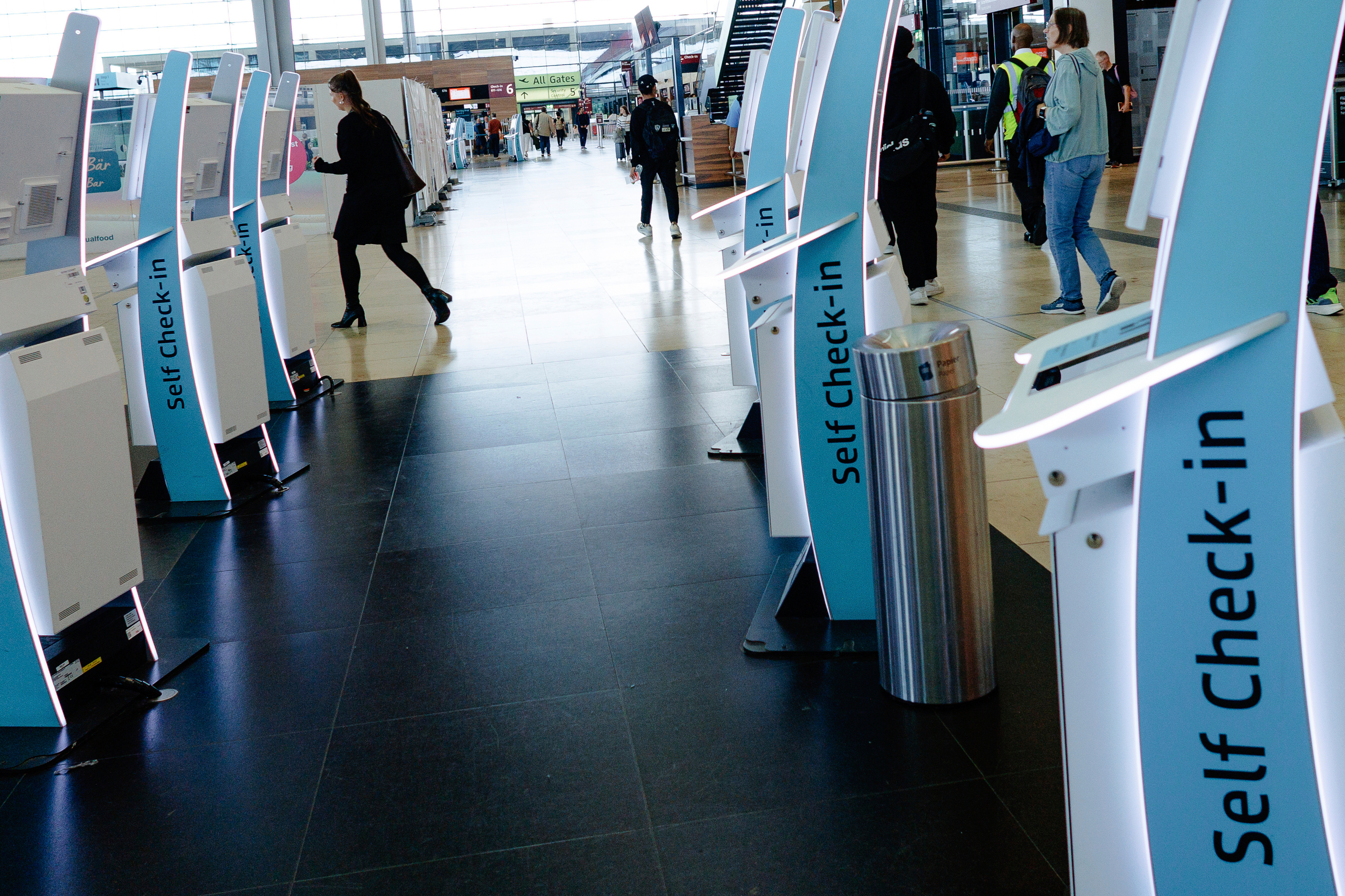 Check-in counters at a terminal at Berlin's Brandenburg airport, in Schönefeld, Germany, Saturday Sept. 20, 2025, after a cyberattack targeting check-in and boarding systems disrupted air traffic at several major European airports. (Carsten Koall - DPA)