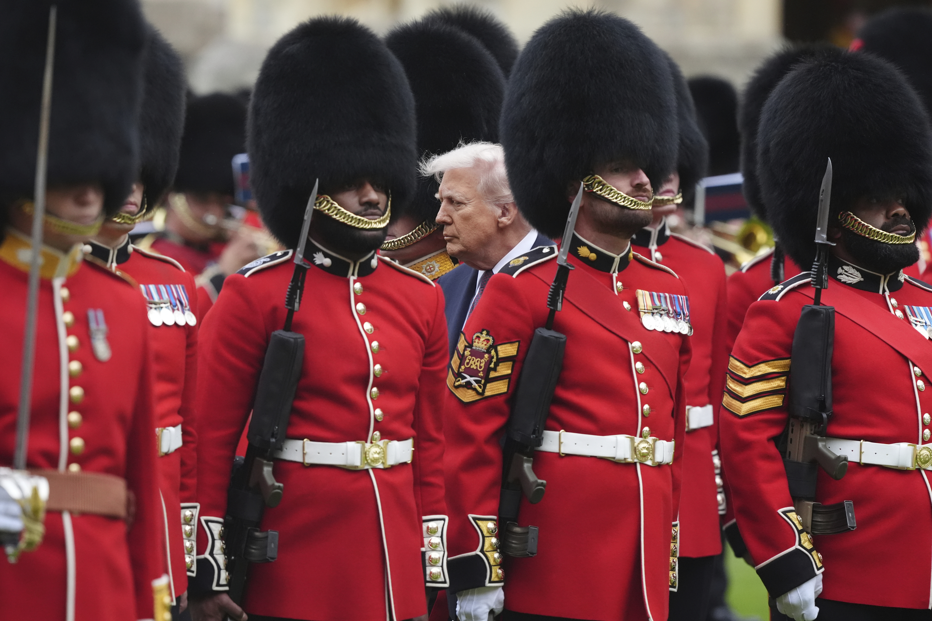 President Donald Trump reviews the guard of honour during the ceremonial welcome at Windsor Castle, England, Wednesday, Sept. 17, 2025. (Jonathan Brady - Pool PA)