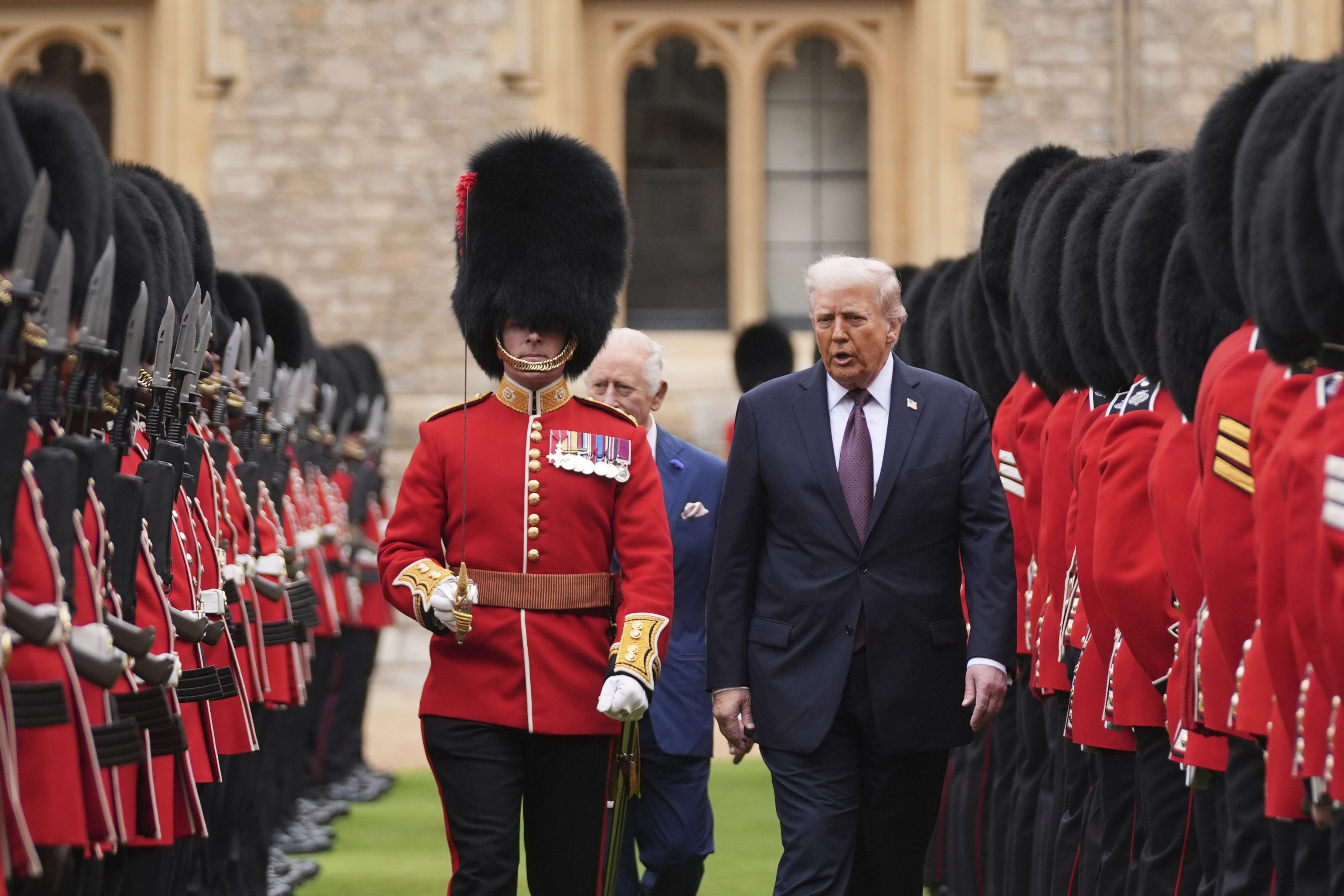 President Donald Trump and Britain's King Charles III inspect the guard of honor during an arrival ceremony at Windsor Castle, in Windsor, England, Wednesday, Sept. 17, 2025. (Evan Vucci - AP)