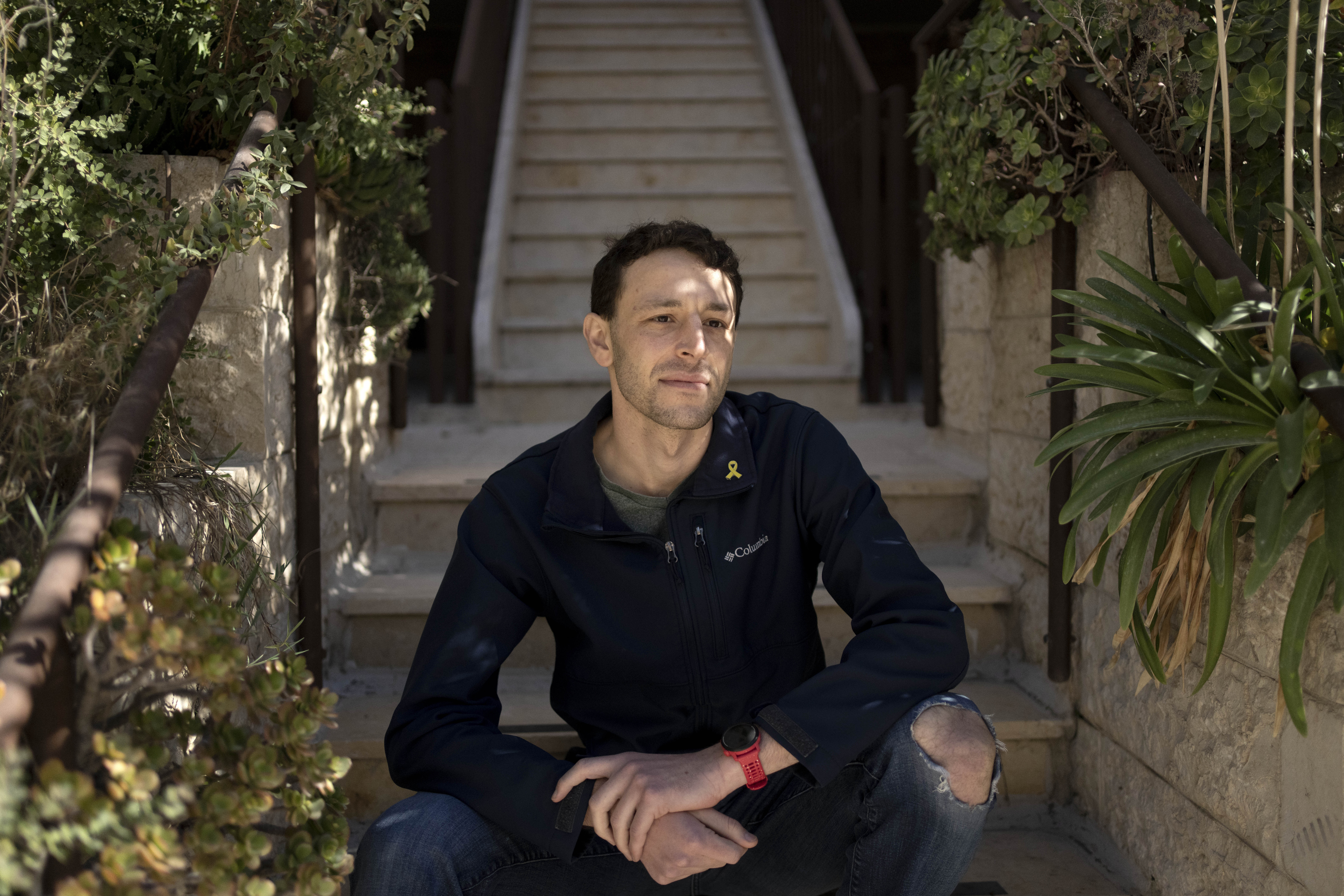FILE - Max Kresch, an army reserve medic who has joined a growing number of Israeli soldiers speaking out against the conflict in Gaza and refusing to continue fighting, poses for a portrait in Jerusalem on Jan. 9, 2025. (Maya Alleruzzo - AP)