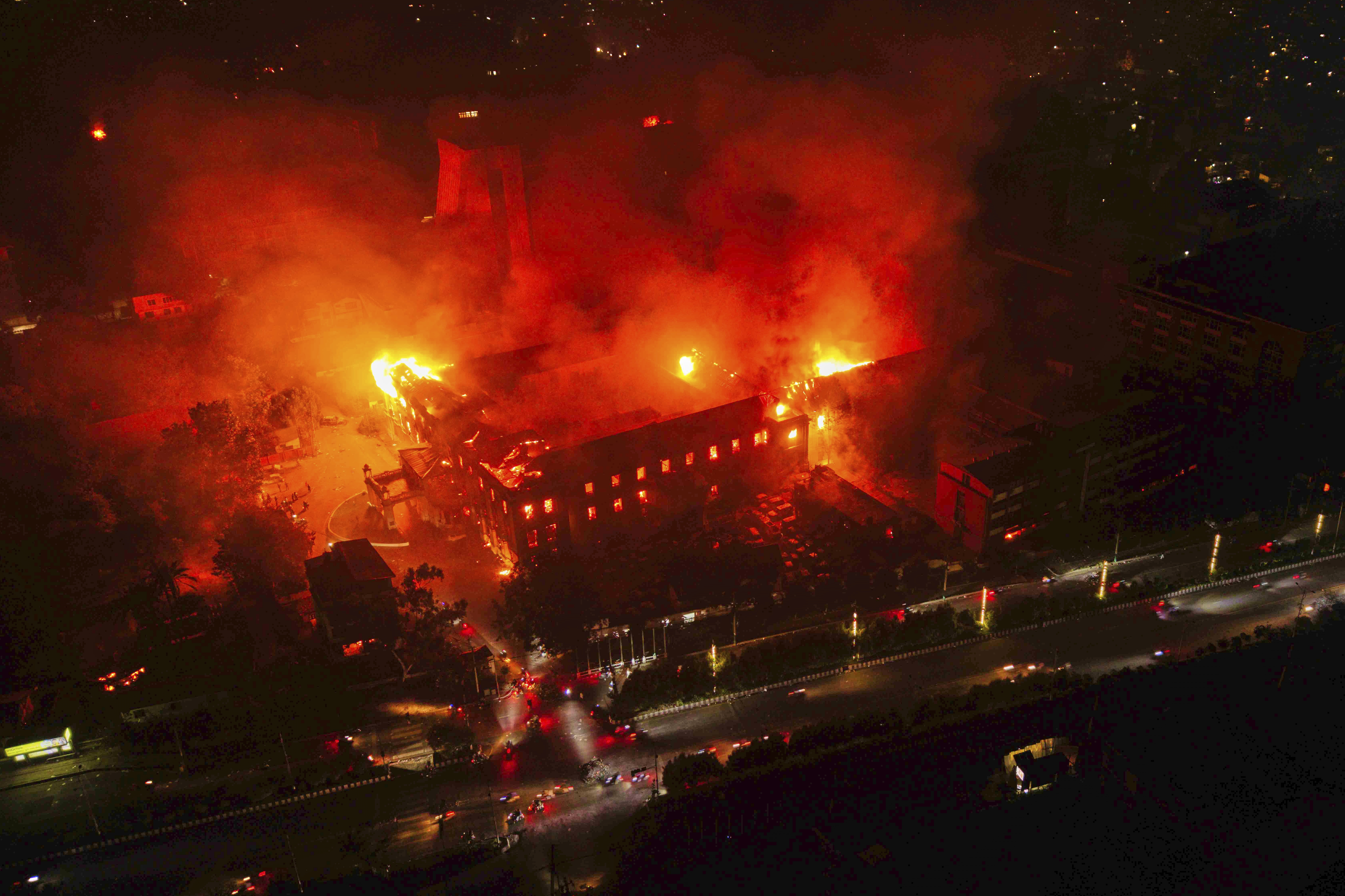 Flames come out from the residence of Nepal President Ram Chandra Poudel after it was set on fire by protesters during a protest against social media ban and corruption in Kathmandu, Nepal, Tuesday, Sept. 9, 2025. (Prabin Ranabhat - AP)