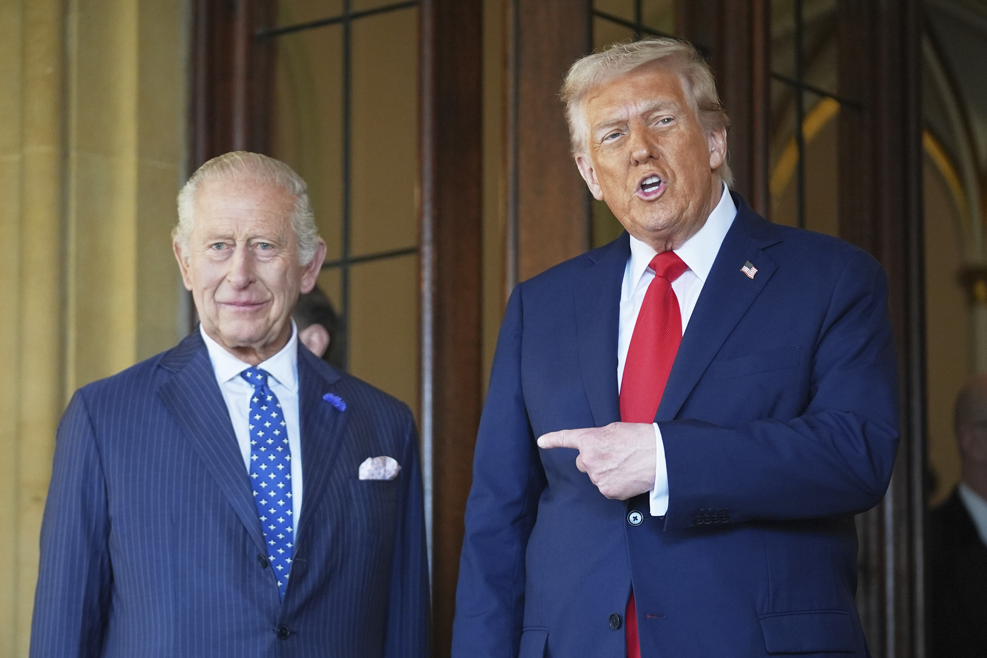 President Donald Trump gestures next to Britain's King Charles III before leaving Windsor Castle, Windsor, England, Thursday, Sept. 18, 2025. (Evan Vucci - AP)