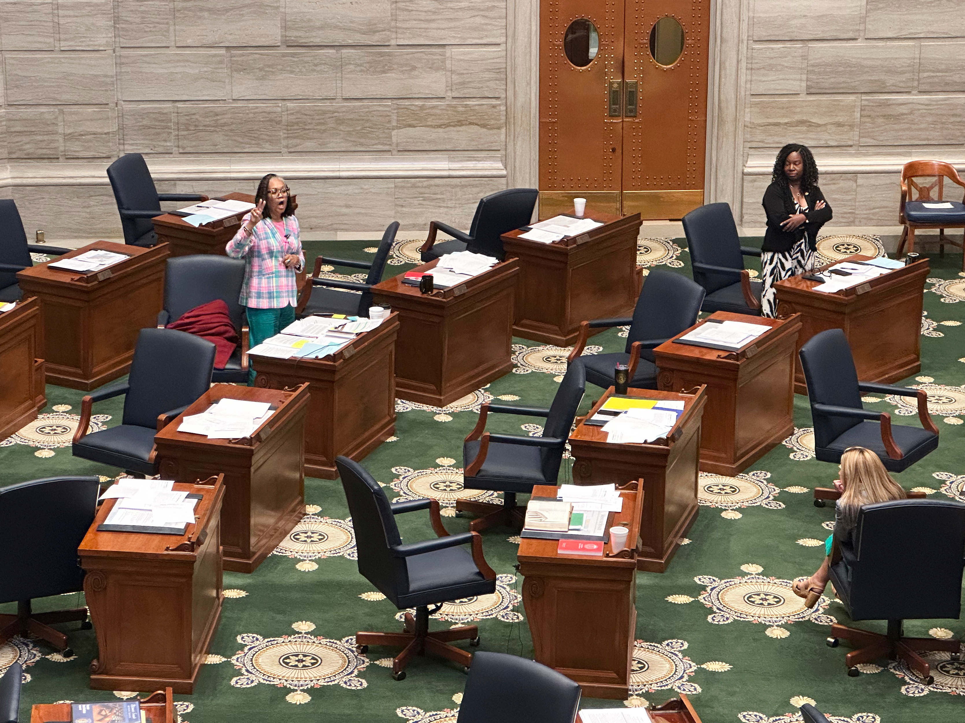 Missouri state Sen. Barbara Washington, left, a Democrat, speaks against a congressional redistricting plan in a largely empty Senate chamber, Friday, Sept. 12, 2025, in Jefferson City, Mo. (David A. Lieb - ap)