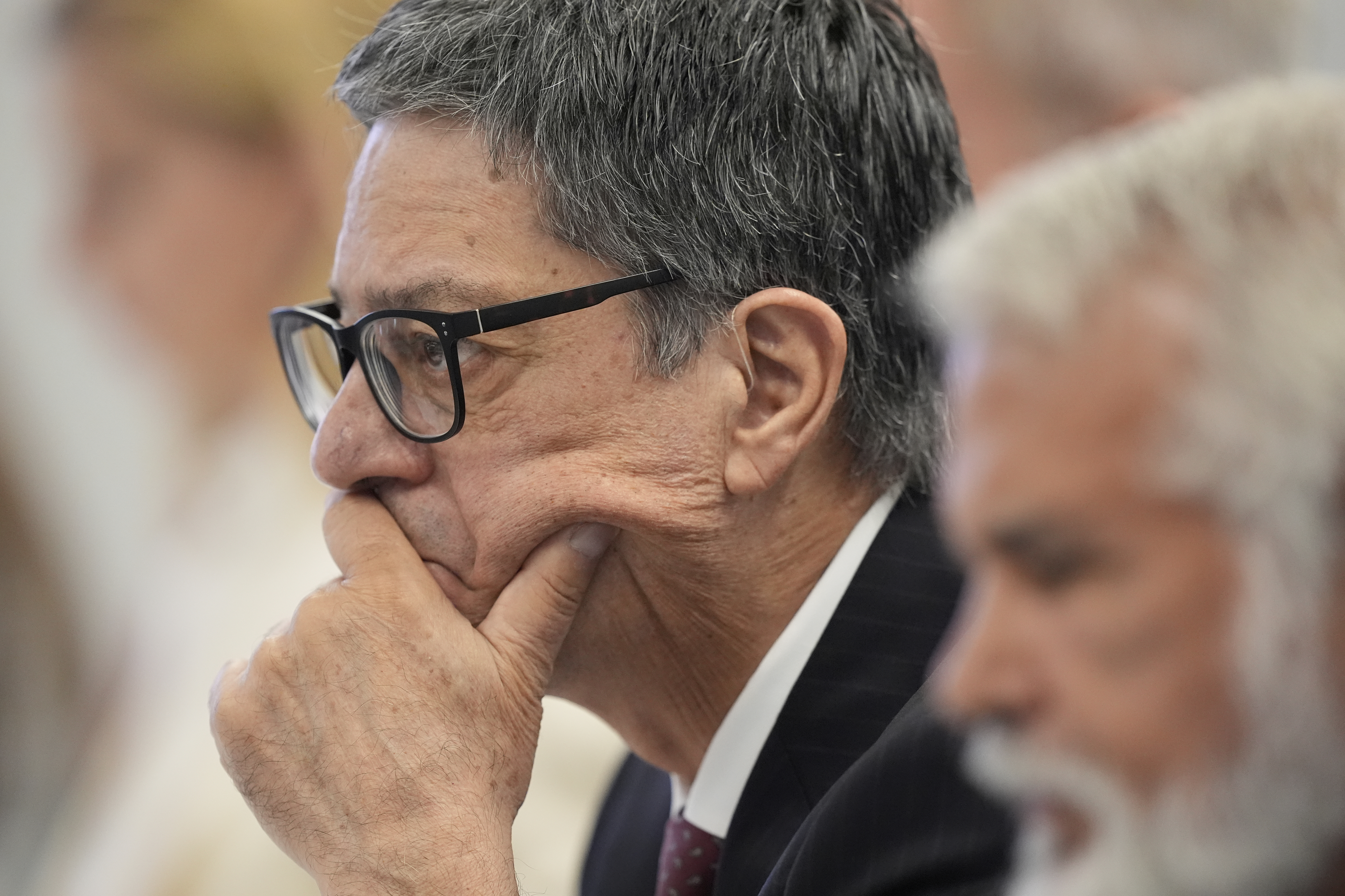 Committee member, Dr. James Pagano listens during a meeting of the Advisory Committee on Immunization Practices at the CDC on Thursday, Sept. 18, 2025, in Chamblee, Ga. (Brynn Anderson - AP)