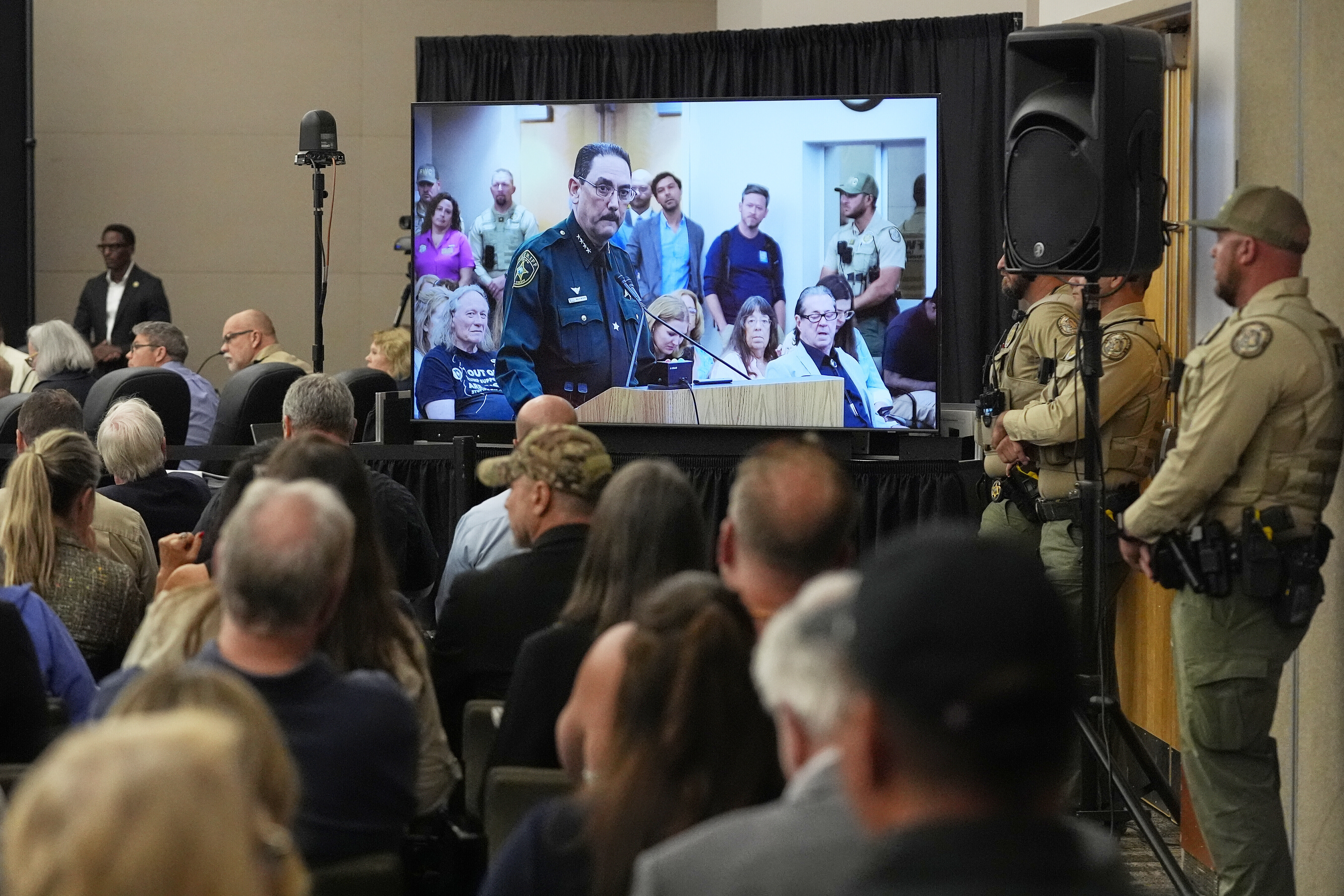 FILE - Marion County sheriff Billy Woods is seen speaking on a monitor during a Florida Fish & Wildlife Commission hearing about proposed bear hunting, May 21, 2025, in Ocala, Fla. (John Raoux - AP)