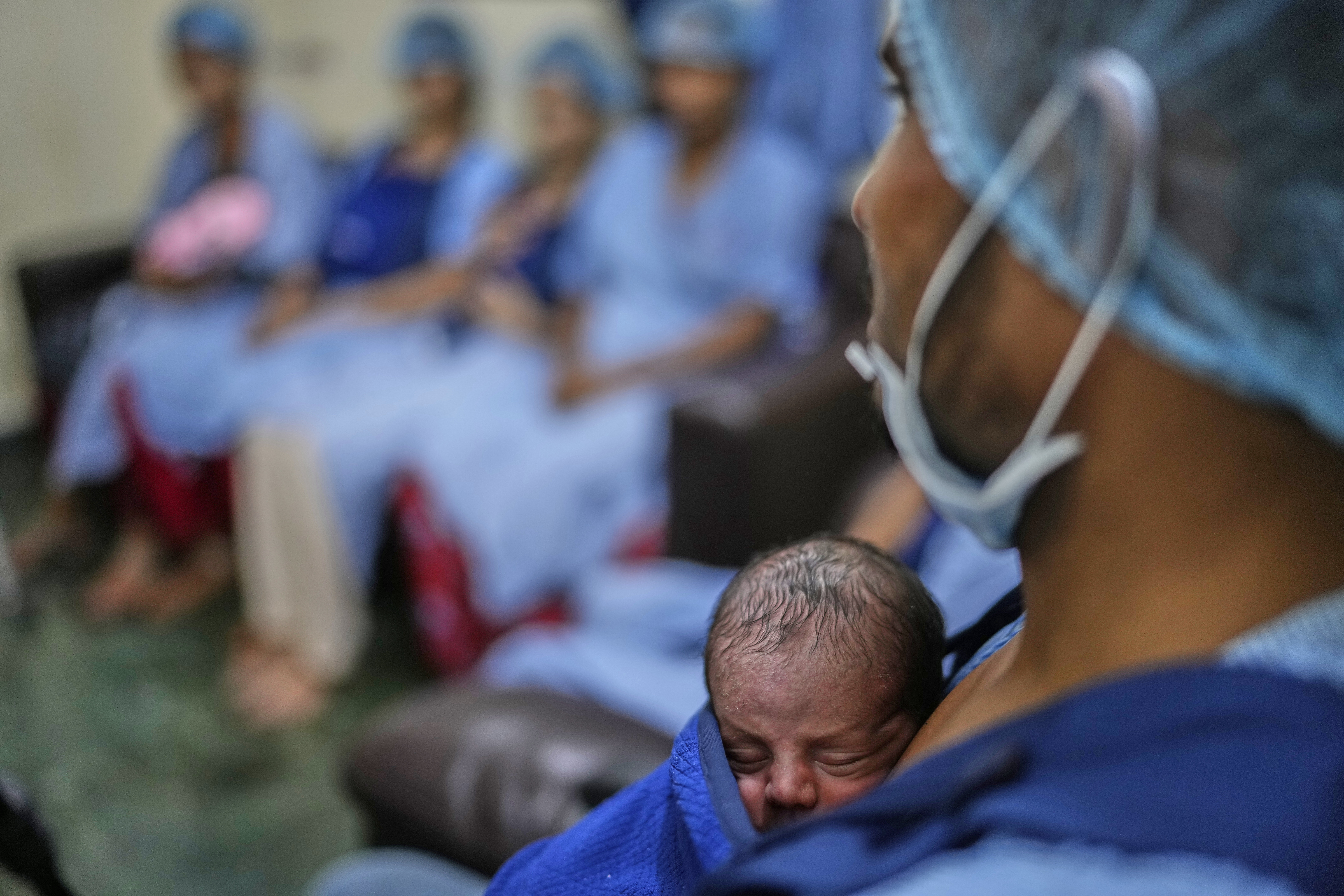 Nurses conduct a Sick Newborn Care Unit session for women whose newborns are premature or sick, at an intensive care unit of a government hospital in Gurugram, a satellite city of New Delhi, India, on Aug. 7, 2025. (Manish Swarup - AP)
