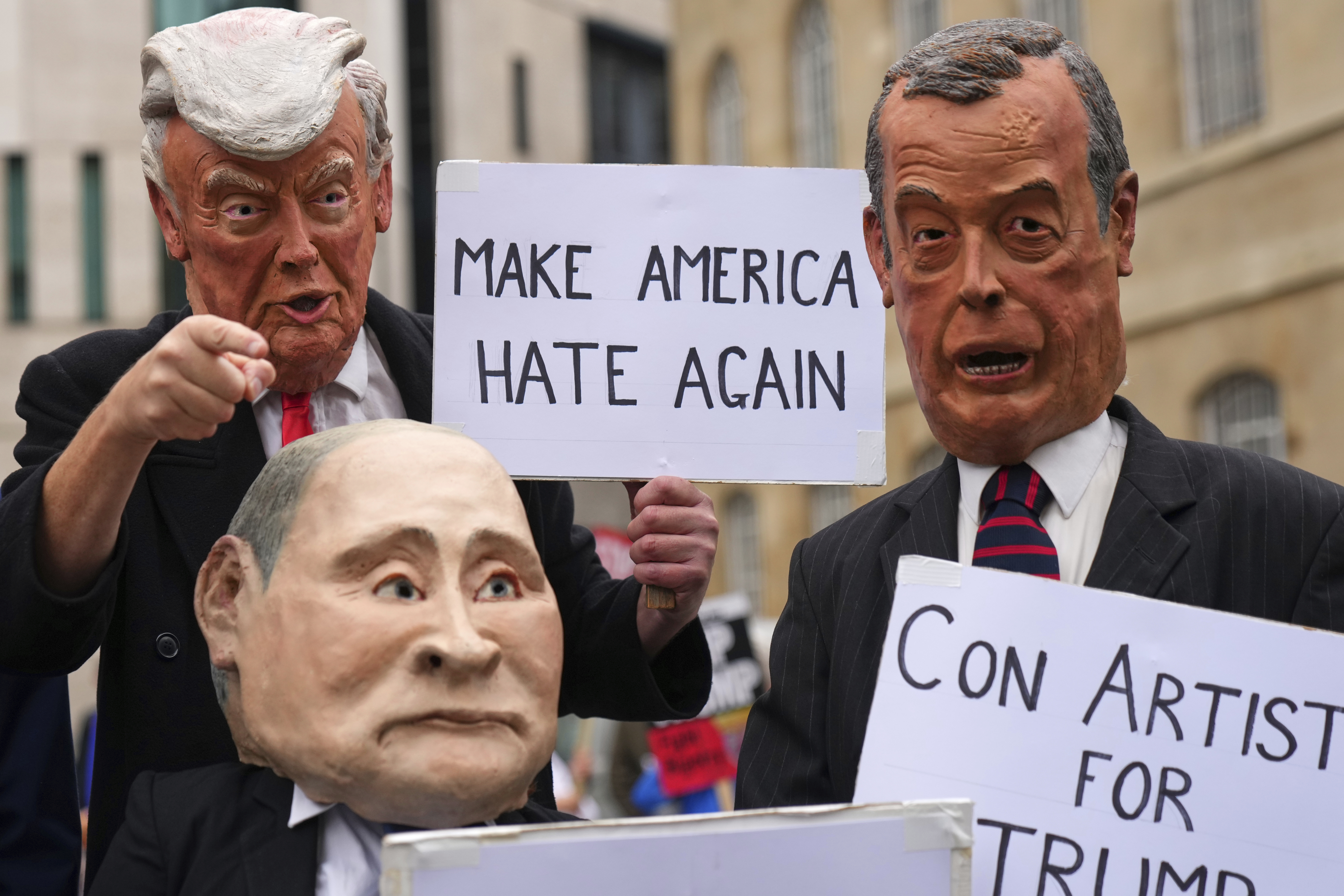 Protesters wear masks of politicians during a demonstration of the Stop Trump Coalition group against President Donald Trump's state visit in London, Wednesday, Sept. 17, 2025. (Joanna Chan - AP)