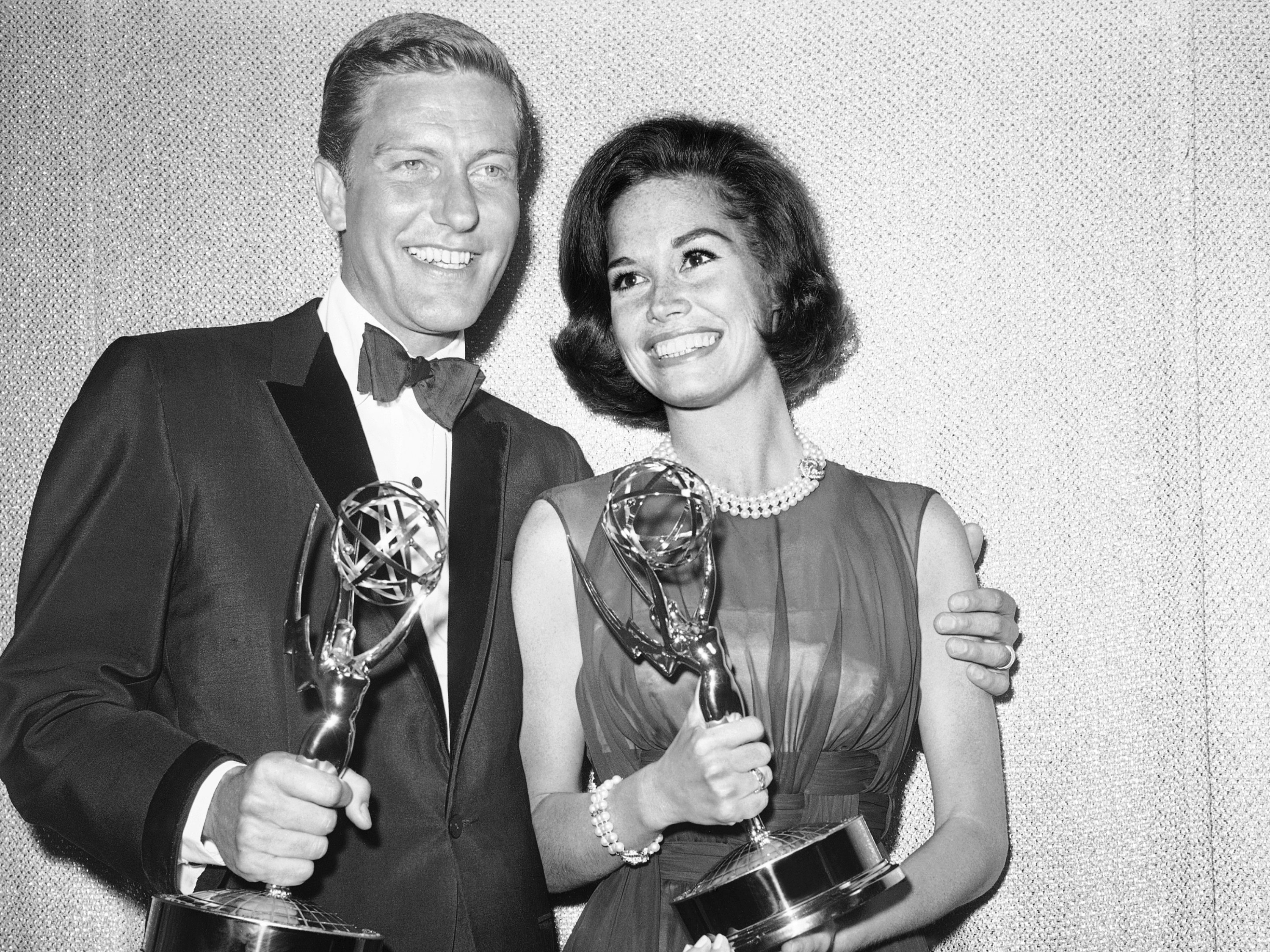 FILE - Dick Van Dyke, left, and Mary Tyler Moore, co-stars of