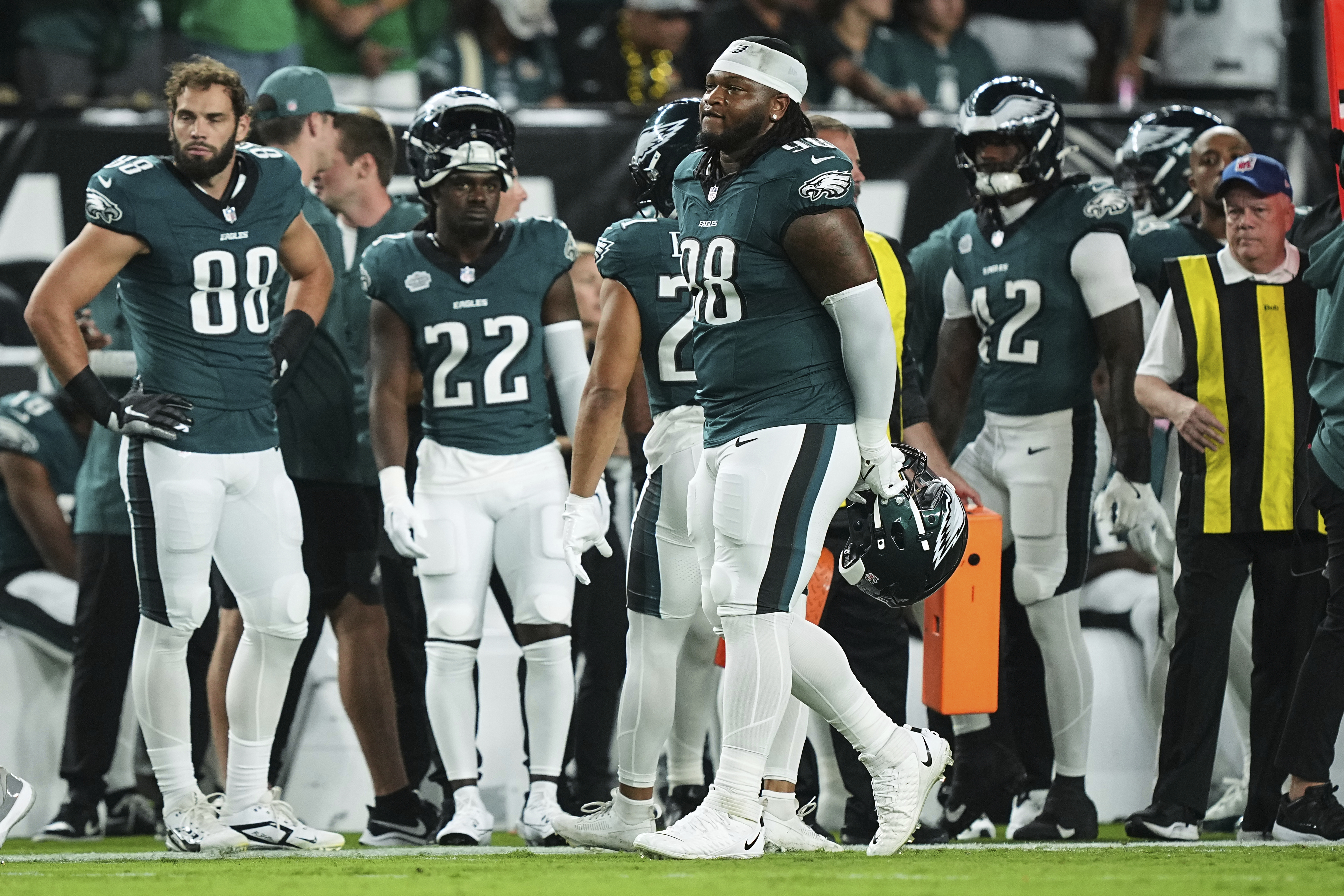 Philadelphia Eagles defensive tackle Jalen Carter (98) walks off the field after being disqualified for unsportsman like conduct before an NFL football game against the Dallas Cowboys Thursday, Sept. 4, 2025, in Philadelphia. (Matt Rourke - AP)