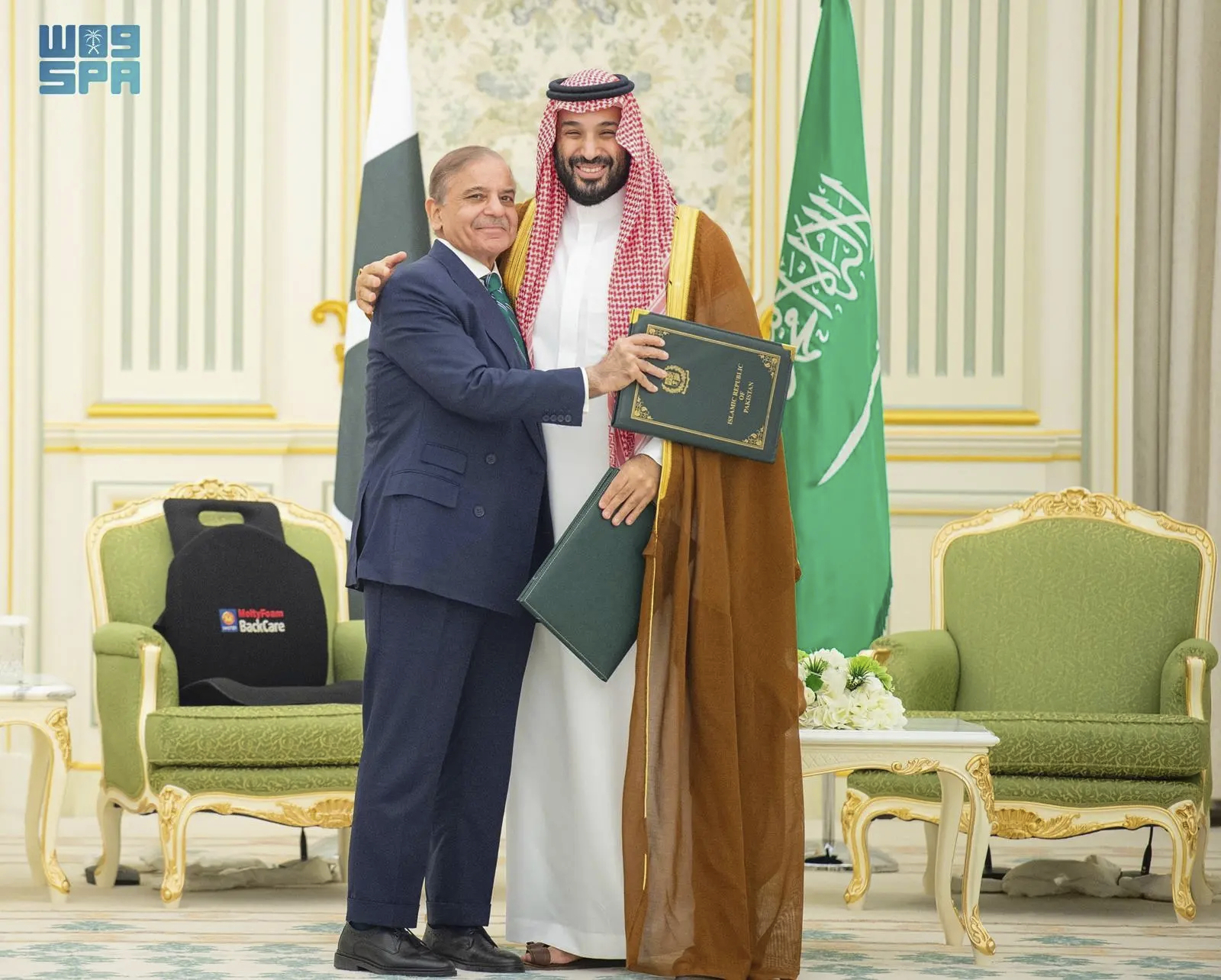 This handout photograph released by the state-run Saudi Press Agency shows Pakistani Prime Minister Shehbaz Sharif, left, embracing Saudi Arabia's Crown Prince Mohammed bin Salman after signing a joint defense pact in Riyadh, Saudi Arabia, Wednesday, Sept. 17, 2025. (Saudi Press Agency - Saudi Press Agency)