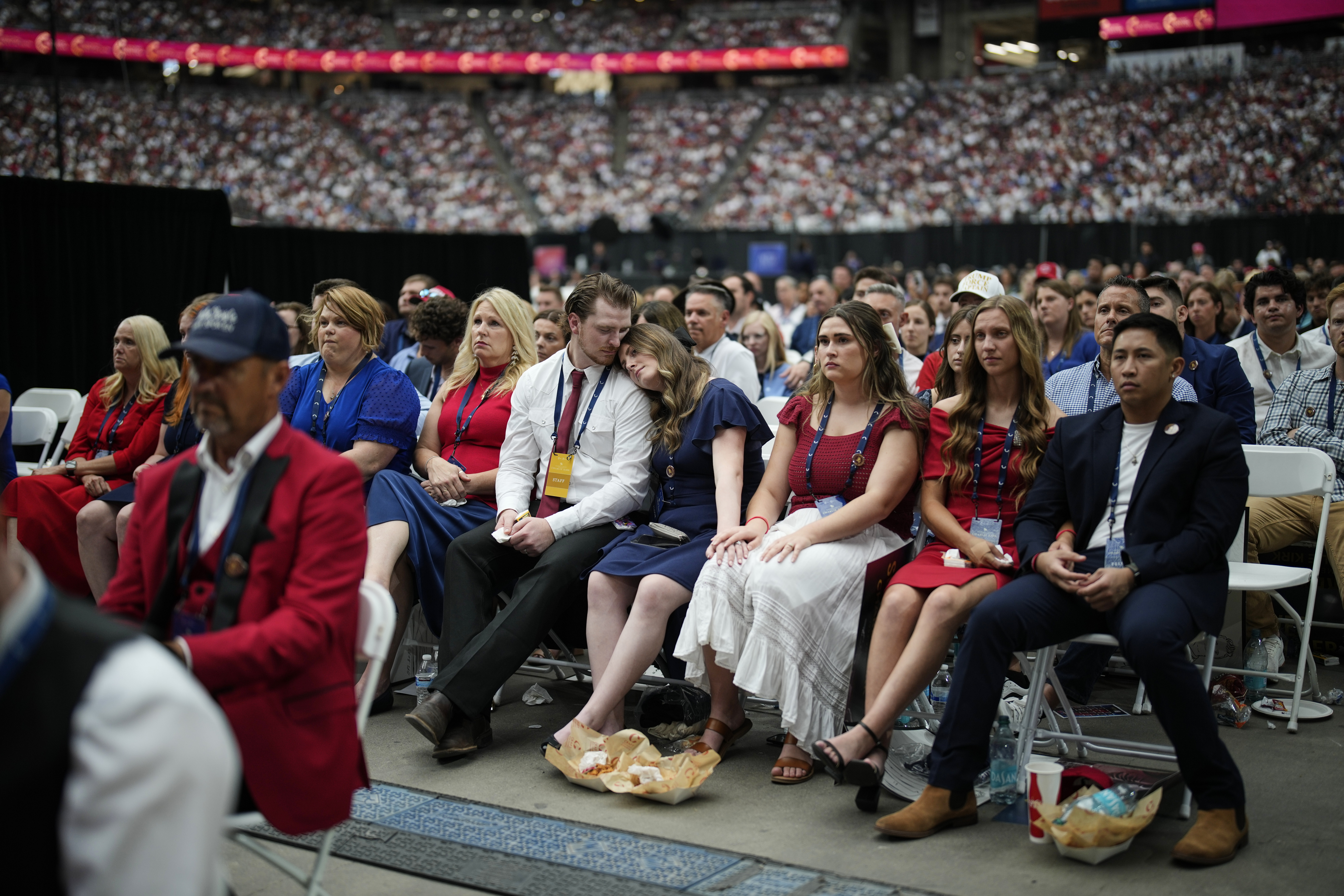 People listen as Erika Kirk speaks at a memorial for her late husband conservative activist Charlie Kirk, Sunday, Sept. 21, 2025, at State Farm Stadium in Glendale, Ariz. (John Locher - AP)